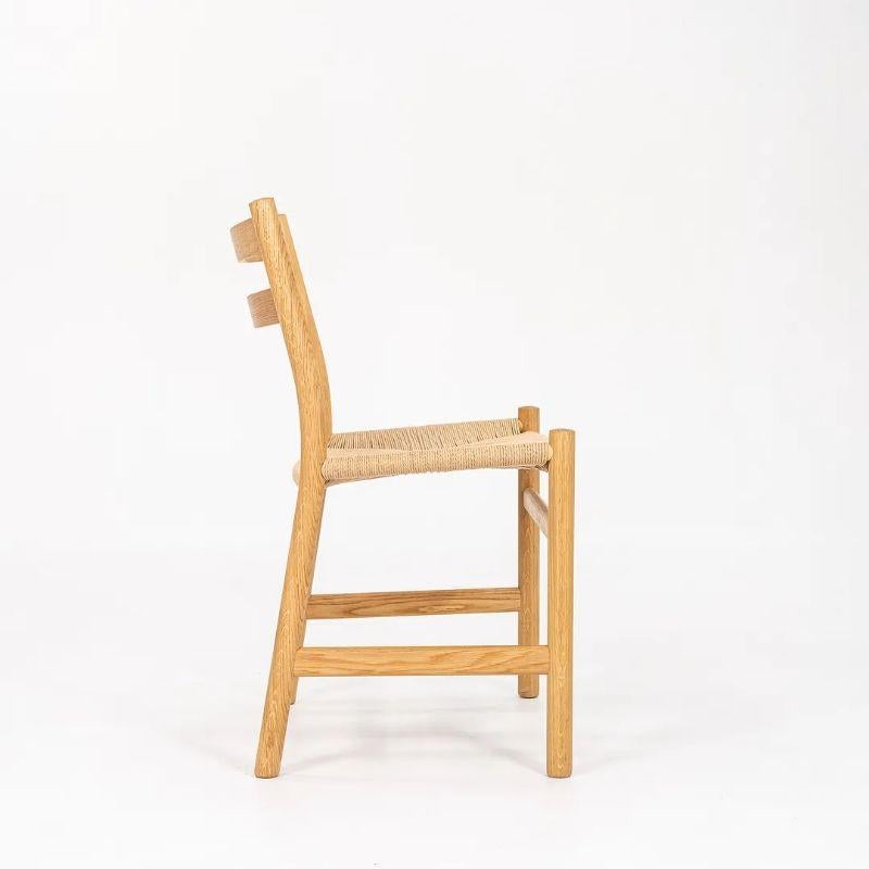 2021 Hans Wegner for Carl Hansen CH47 Dining Chair in Oak w/ Natural Papercord In Fair Condition For Sale In Philadelphia, PA