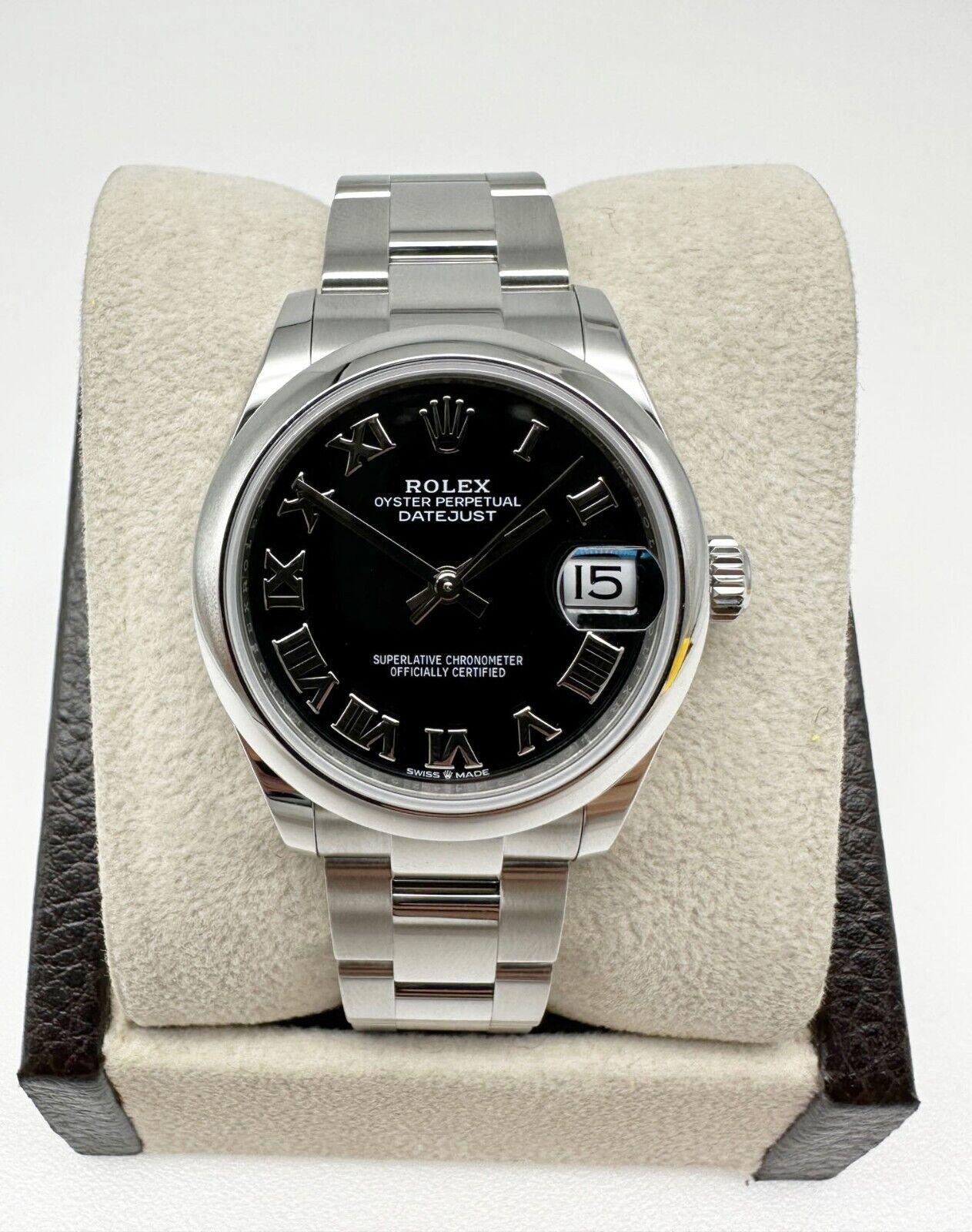 Rolex Montre Datejust 2021 de taille moyenne en acier 31 mm avec cadran romain noir et papier de boîte en vente 2