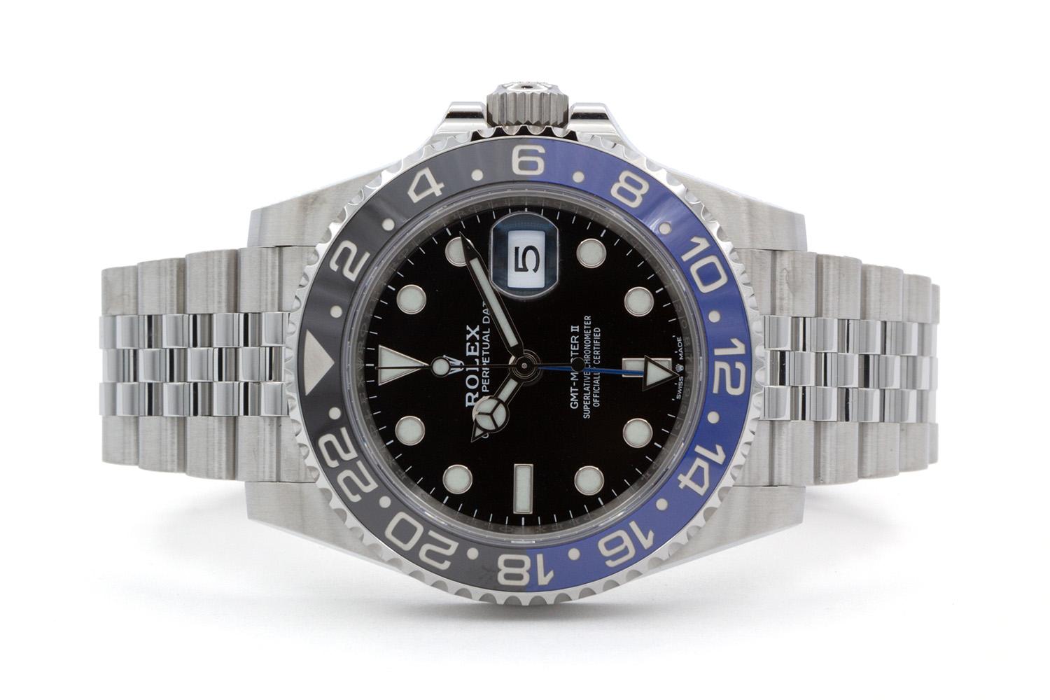 We are pleased to offer this excellent condition June 2021 Rolex Mens Stainless Steel GMT Master II 126710BLNR “Batman” 