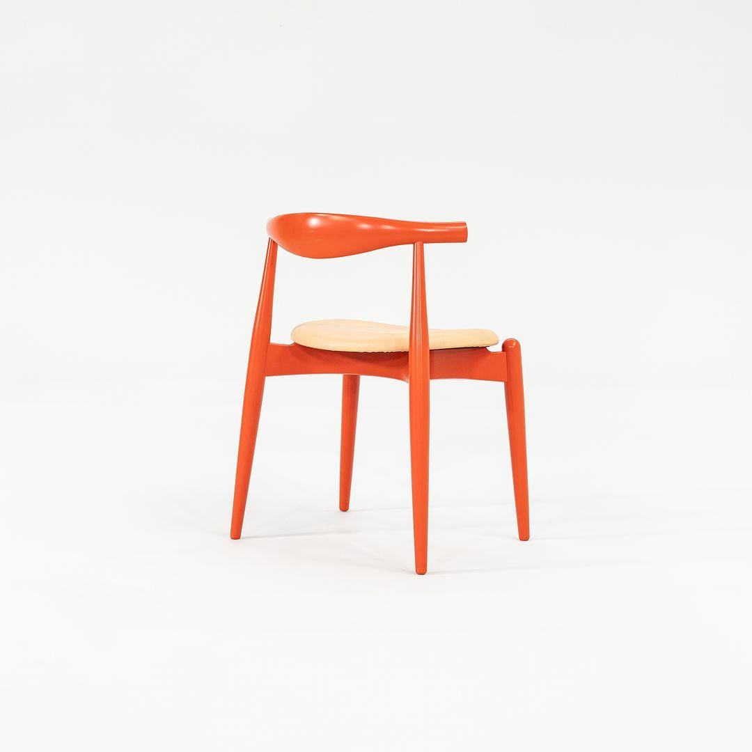 2022 Carl Hansen CH20 by Hans Wegner Bright Orange Beech Wood with Tan Leather In Excellent Condition For Sale In Philadelphia, PA