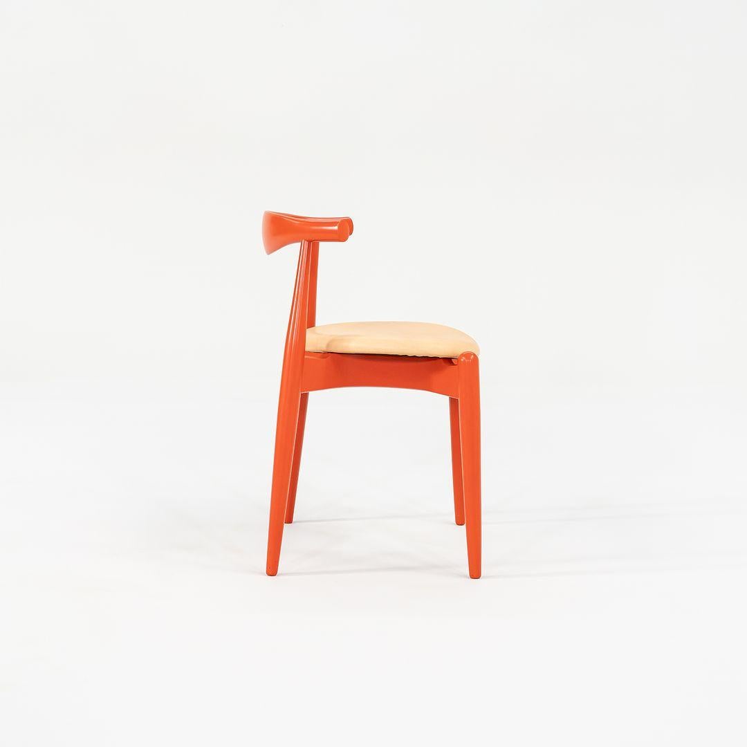 2022 Carl Hansen CH20 by Hans Wegner Bright Orange Beech Wood with Tan Leather For Sale 1