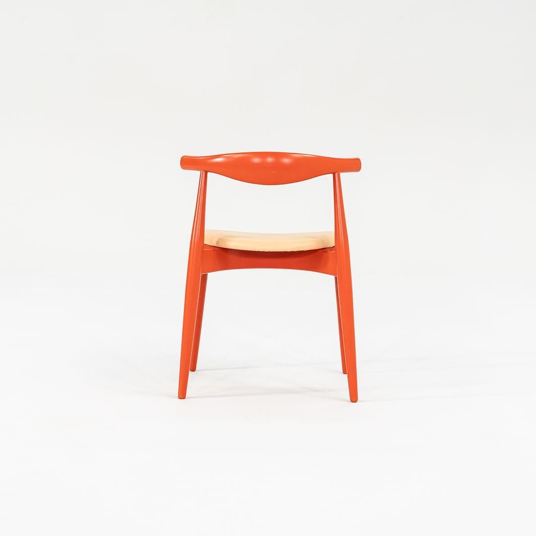 2022 Carl Hansen CH20 by Hans Wegner Bright Orange Beech Wood with Tan Leather For Sale 2