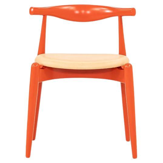 2022 Carl Hansen CH20 by Hans Wegner Bright Orange Beech Wood with Tan Leather For Sale