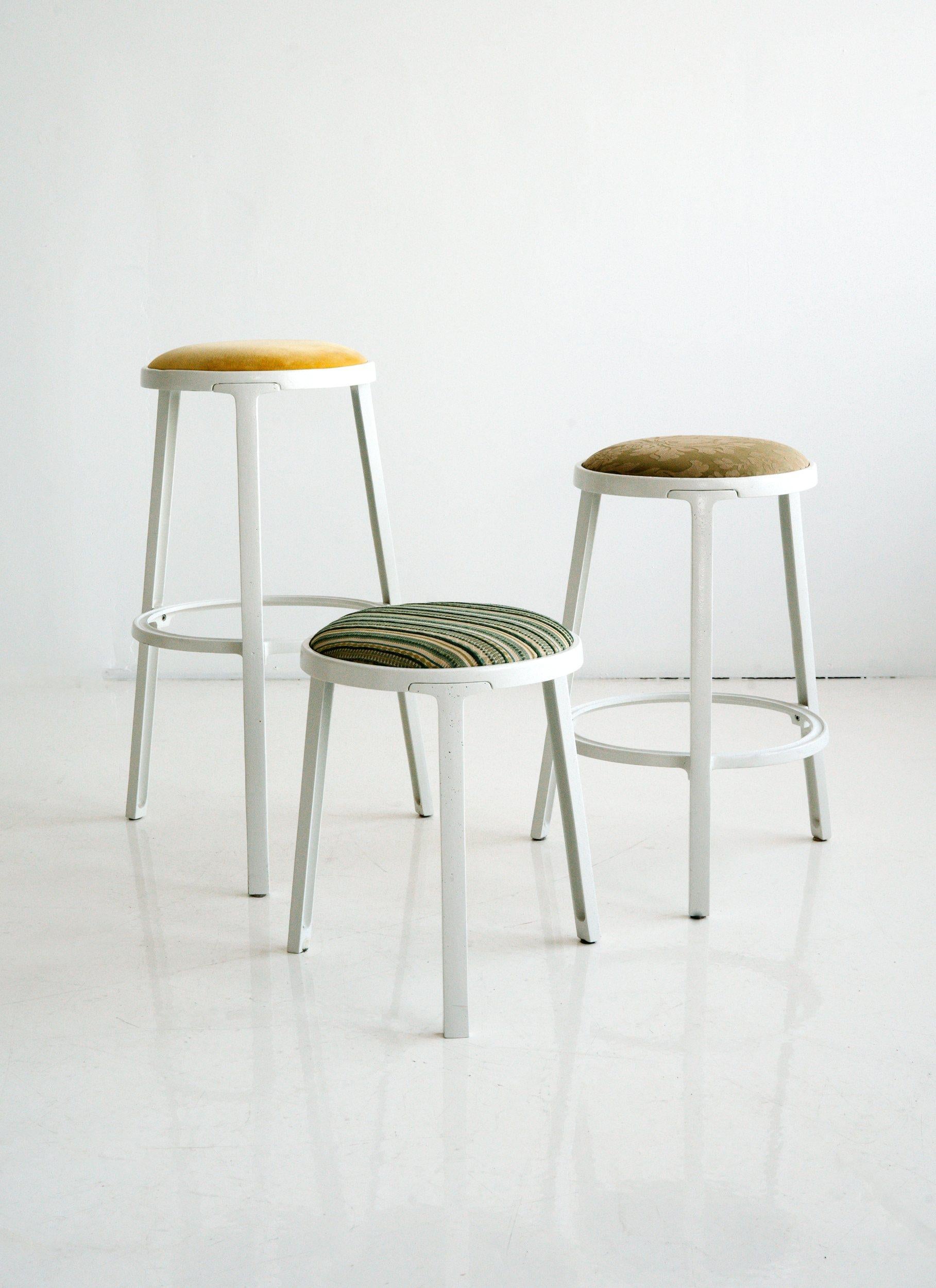 This stool features cast aluminum construction and can use customer's own material for upholstery.

Founded in 2011, AKMD developed out of a thirteen-year friendship and design collaboration between Ayush Kasliwal and Mike Dreeben.

The two met in