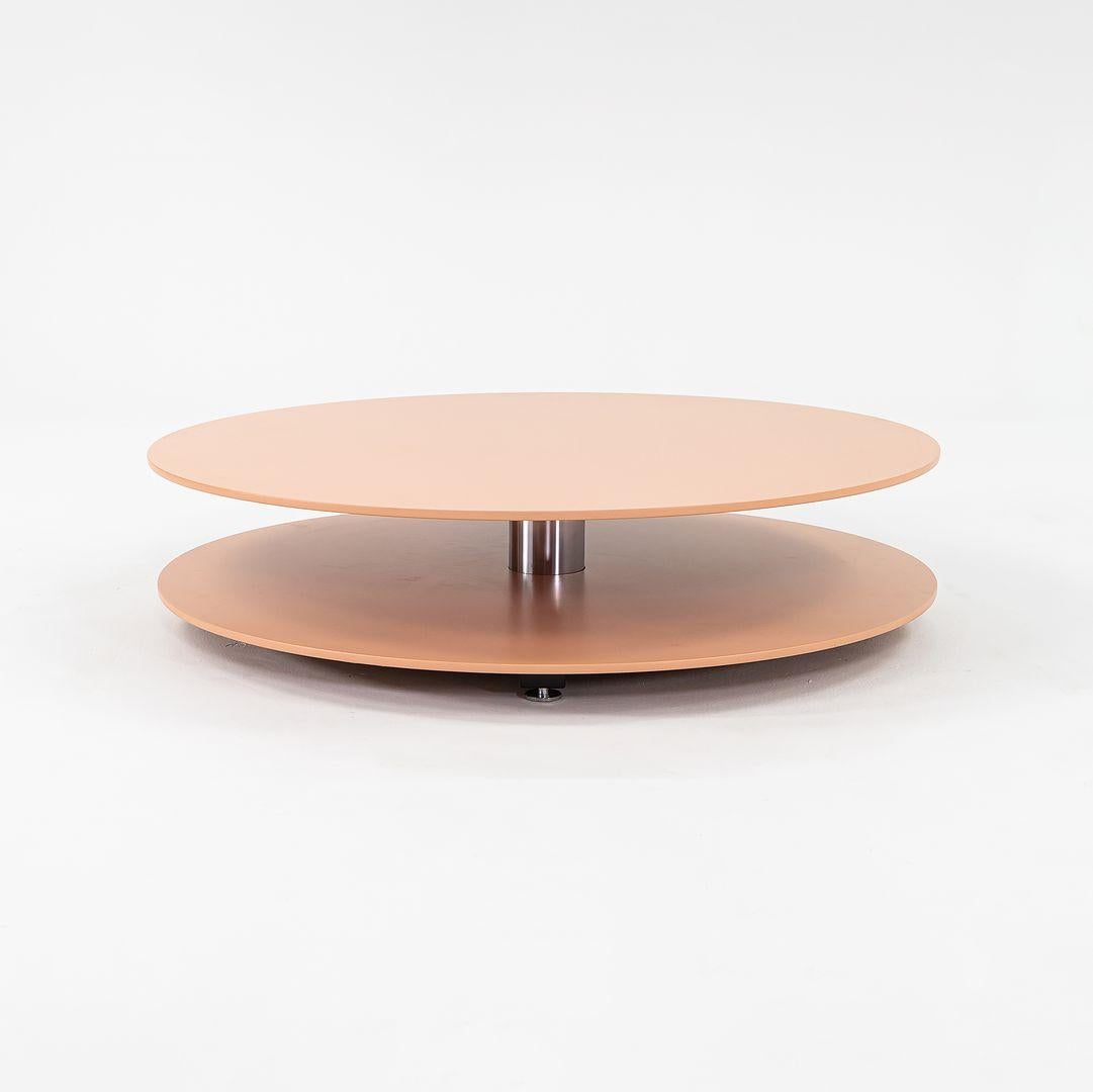 Listed for sale is an Altavilla Round Coffee Table made with a pink lacquered top and chromed steel base. The table was designed by Giulio Cappellini and produced by Cappellini¬†in Italy. It dates to circa 2022 and is guaranteed as