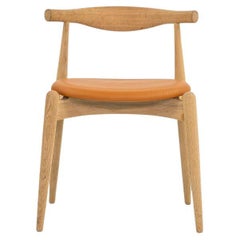 2022 Hans Wegner for Carl Hansen CH20 Elbow Chair Oak with Caramel Leather Pad