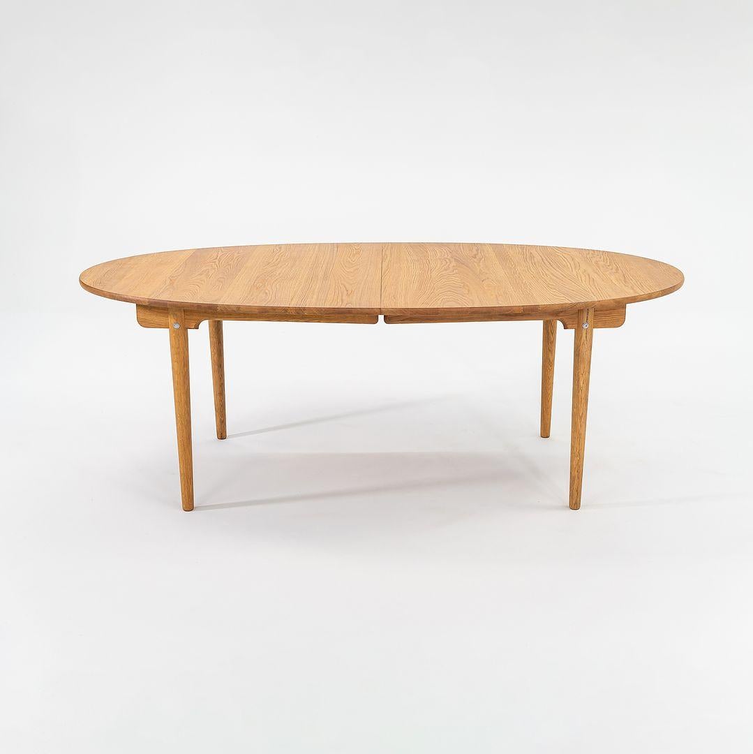 Danish 2022 Hans Wegner for Carl Hansen CH338 Dining Table with Two Leaves in Oiled Oak