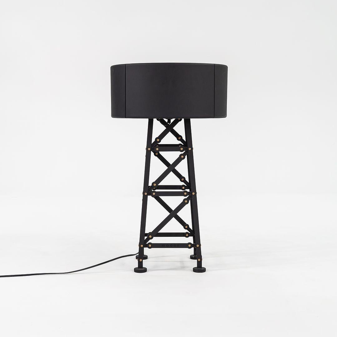 Listed for sale is a Small UL Construction Floor Lamp made of matte black diecast powder coated aluminum with a bent steel shade. The lamp was designed by Joost Van Bleiswijk and produced by Moooi¬†in the Netherlands. It dates to circa 2022 and is