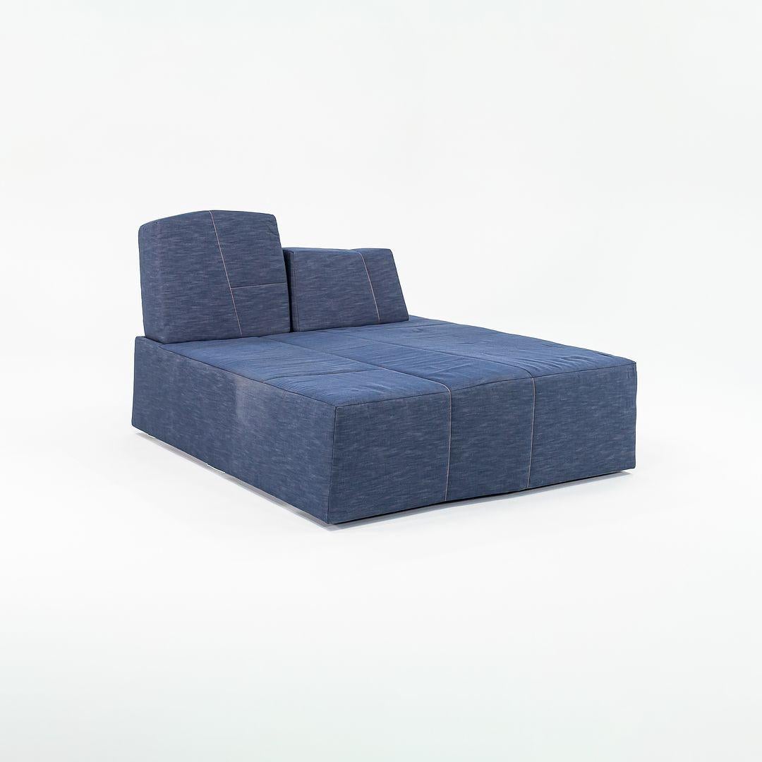 Nous proposons à la vente une chaise longue SLT en bois, acier et tissu denim indigo. La chaise longue a été conçue par Marcel Wanders et produite par Moooi¬† aux Pays-Bas. Il date d'environ 2022 et est garanti comme authentique.†Condition est bonne