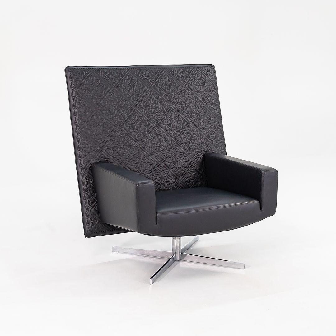 Listed for sale is a Jackson Lounge Chair made with a steel frame and black embroidered leather. The chair was designed by Marcel Wanders Studios and produced by Moooi¬†in the Netherlands. It dates to circa 2022 and is guaranteed as