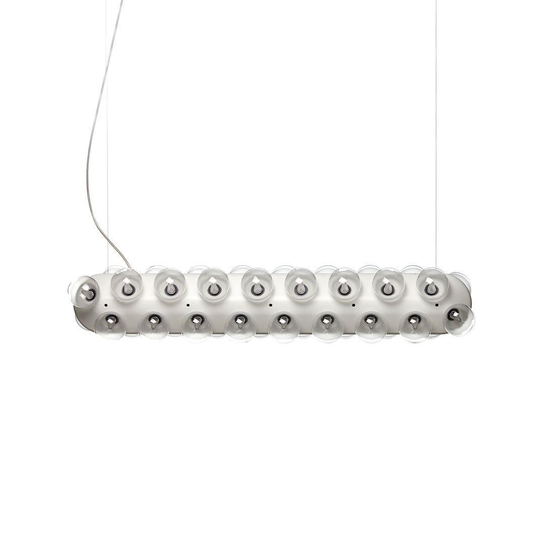 Listed for sale is a Double Horizontal Prop Light Suspended, 2700K, made of polystyrene, PMMA and glass. The lamp was designed by Bertjan Pot and produced by Moooi¬†in the Netherlands. It dates to circa 2022 and is guaranteed as