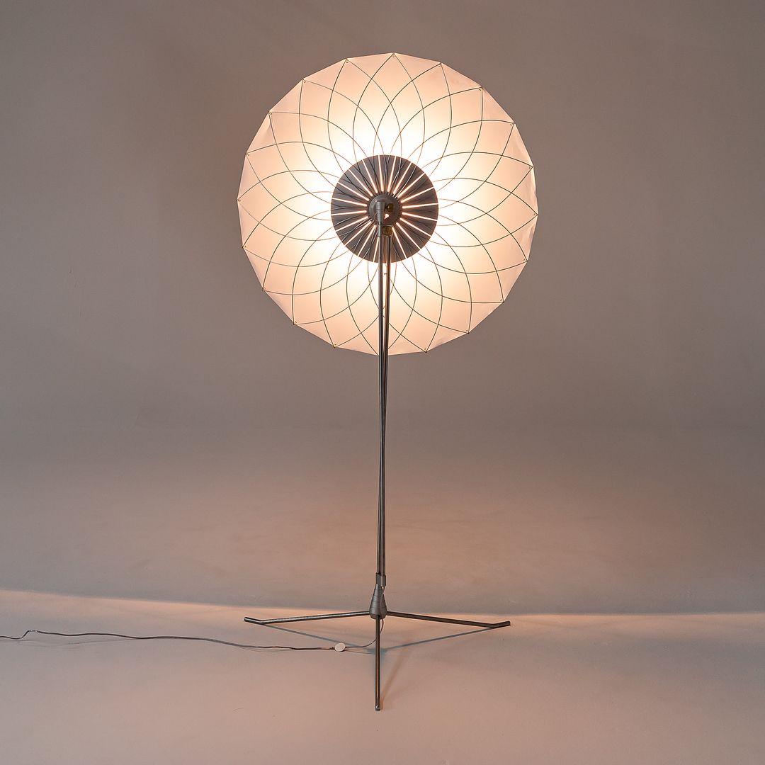 Listed for sale is a Filigree UL Floor Lamp (three are available, but they are priced individually), made of translucent polypropylene, brass, stainless steel, and aluminum. The lamp was designed by Rick Tegelaar and produced by Moooi¬†in the