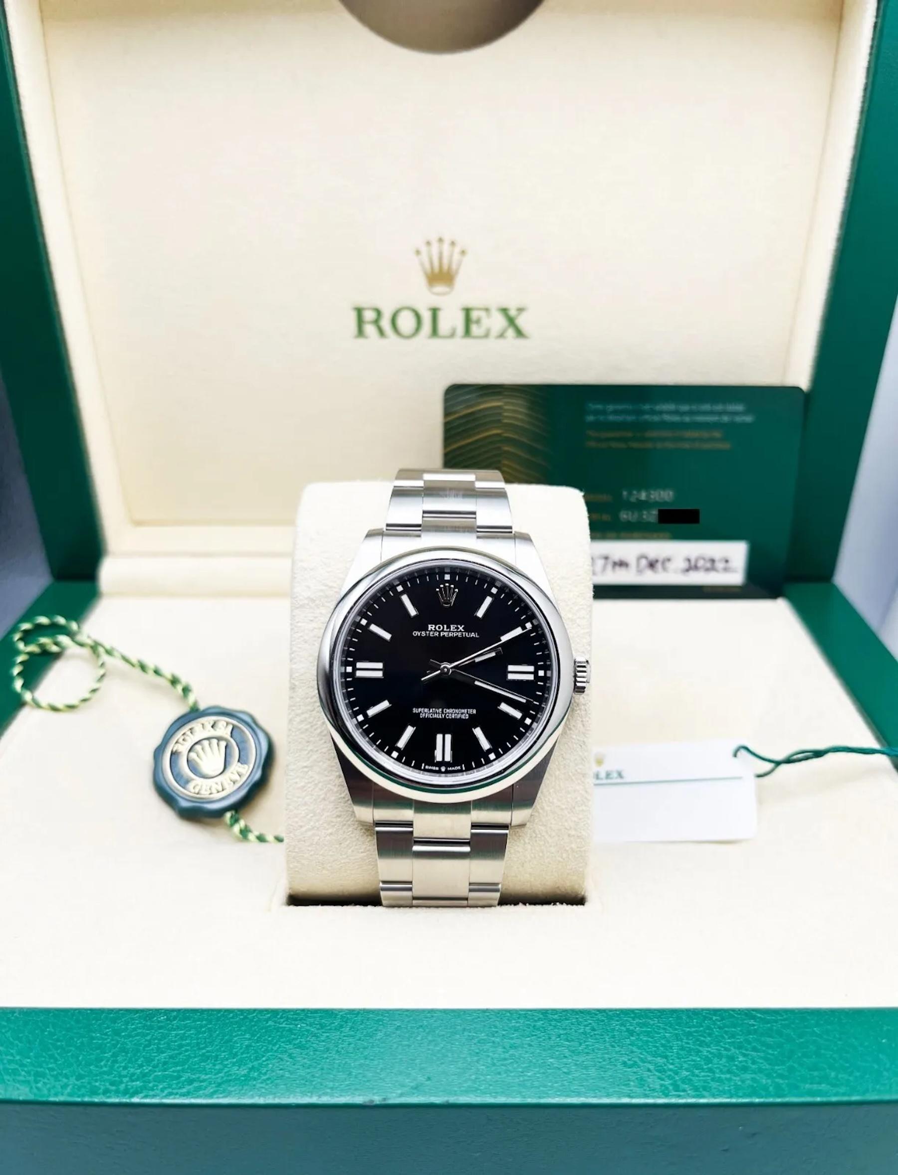 Style Number: 124300

Serial: 6U3Z7***

Year: 2022

Model: Oyster Perpetual

Case Material: Stainless Steel

Band: Stainless Steel

Bezel: Stainless Steel

Dial: Black

Face: Sapphire Crystal

Case Size: 41mm

Includes: 

-Rolex Box &