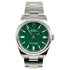 Used 2022 Rolex 126000 Oyster Perpetual Green Dial Stainless Steel Box Paper