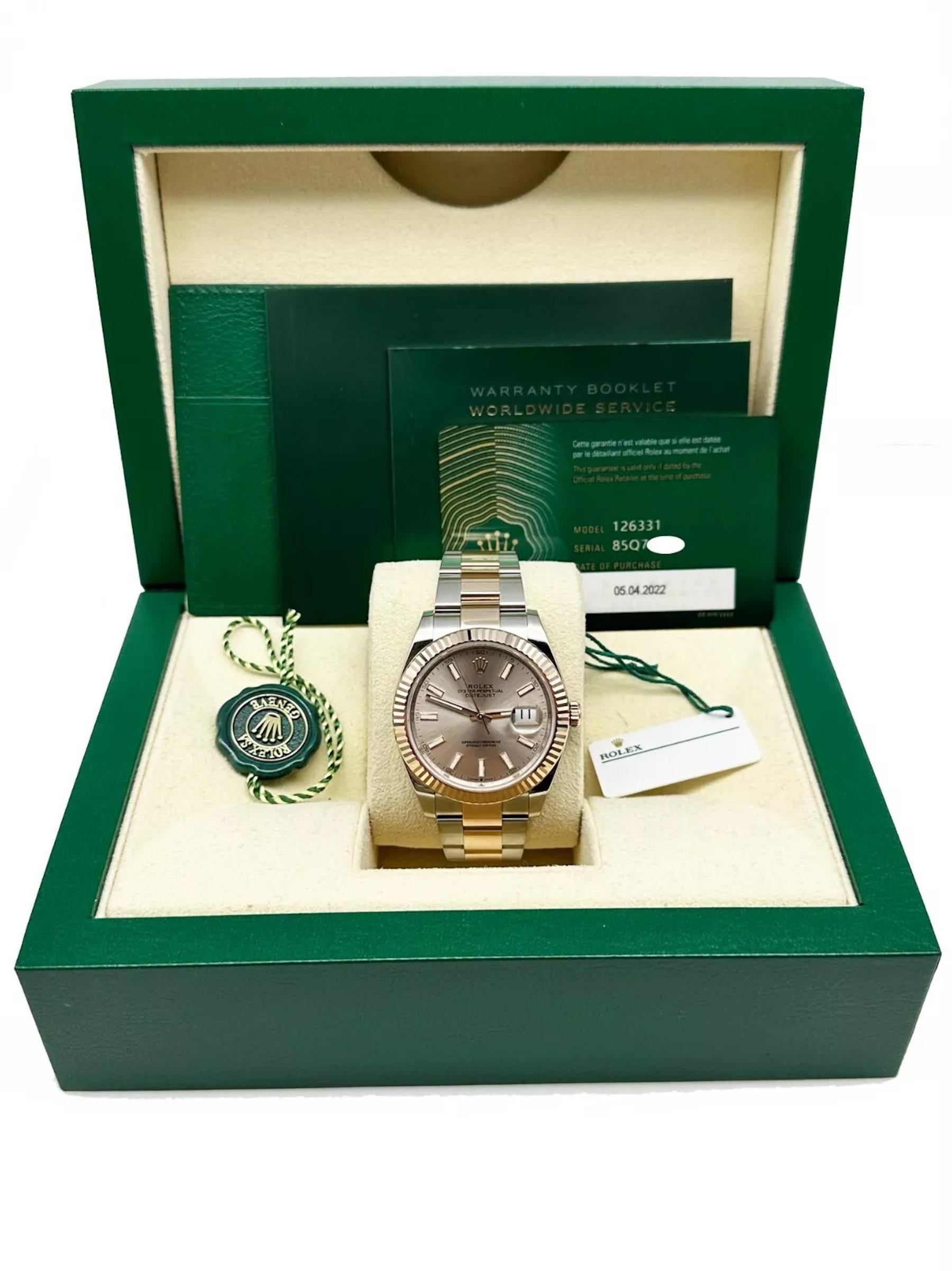 Style Number: 126331
Serial: 85Q70***
Year: 2022
Model: Rolex Datejust 41
Case Material: Stainless Steel 
Band: 18K Rose Gold & Stainless Steel 
Bezel: 18K Rose Gold
Dial: Sundust Dial 
Face: Sapphire Crystal 
Case Size: 41mm 
Includes: 
-Rolex Box