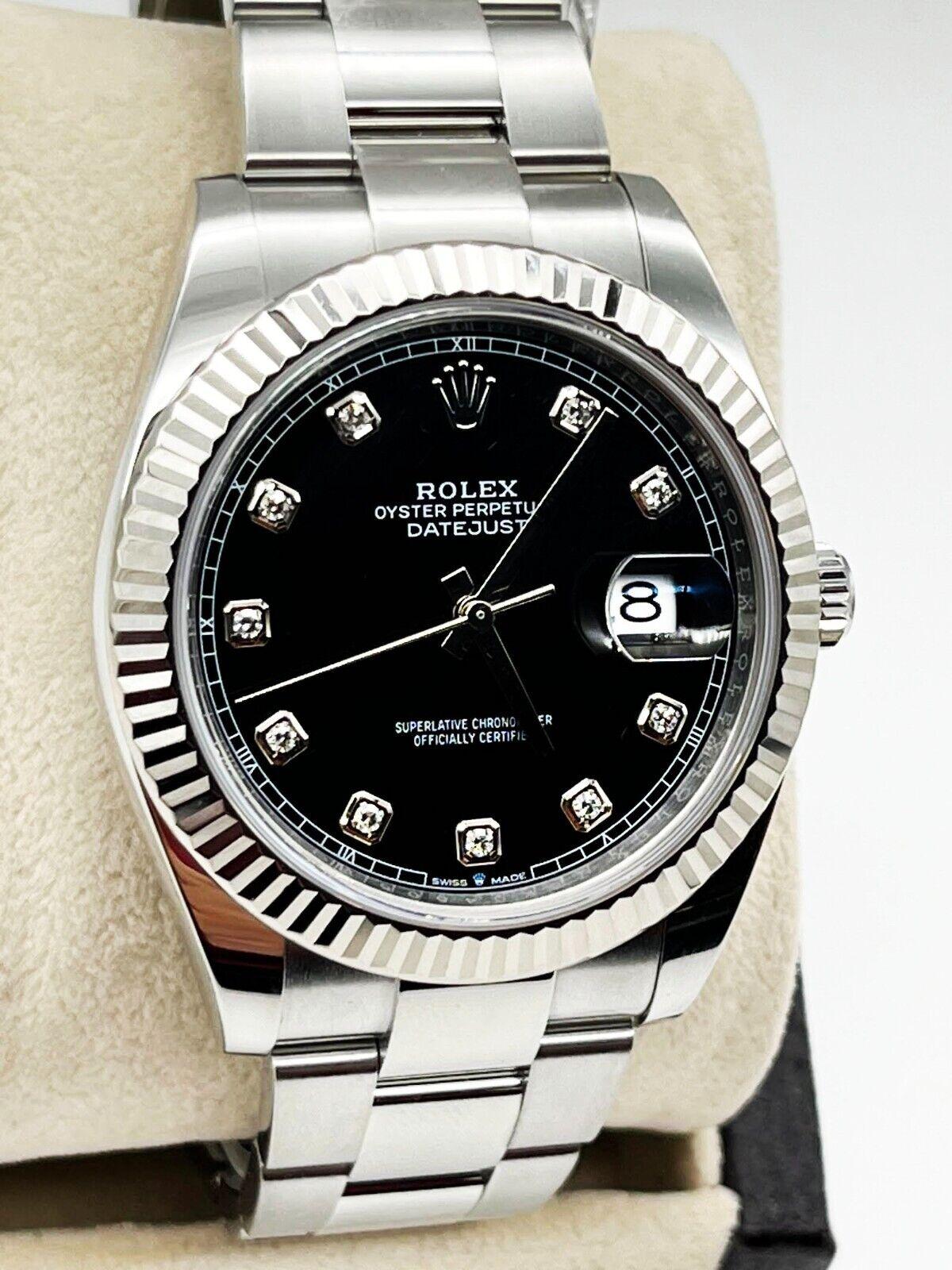 Numéro de style : 126334

Série : 78K04***

Année : 2022

Modèle : Datejust 41

Matériau du boîtier : Acier inoxydable

Bande : Acier inoxydable

Lunette : Lunette cannelée en or blanc 18K 

Cadran : Cadran à diamants d'origine 

Visage : Cristal
