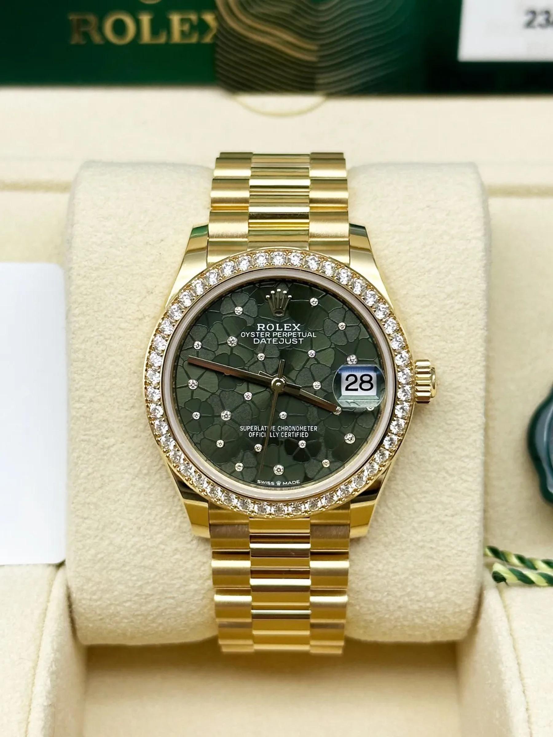 Stilnummer: 278288RBR

Seriennummer: 2XU01***

Jahr: 2022

Modell: Ladies President Midsize 

MATERIAL des Gehäuses: 18K Gelbgold 

Band:  18K Gelbgold 

Lünette:  Original Fabrik Diamant Lünette 

Zifferblatt: Olivgrünes, florales Zifferblatt
