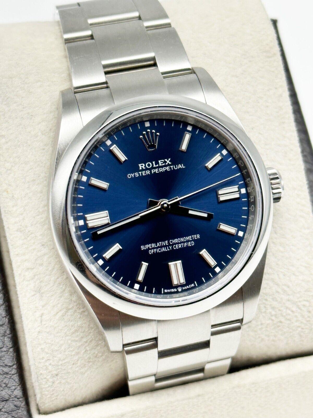 Style Number: 126000

Serial: Z30Z7***

Year: 2022

Model: Oyster Perpetual 

Case Material: Stainless Steel 

Band: Stainless Steel 

Bezel: Stainless Steel Smooth Bezel 

Dial: Blue Dial 

Face: Sapphire Crystal 

Case Size: 36mm 

Includes: