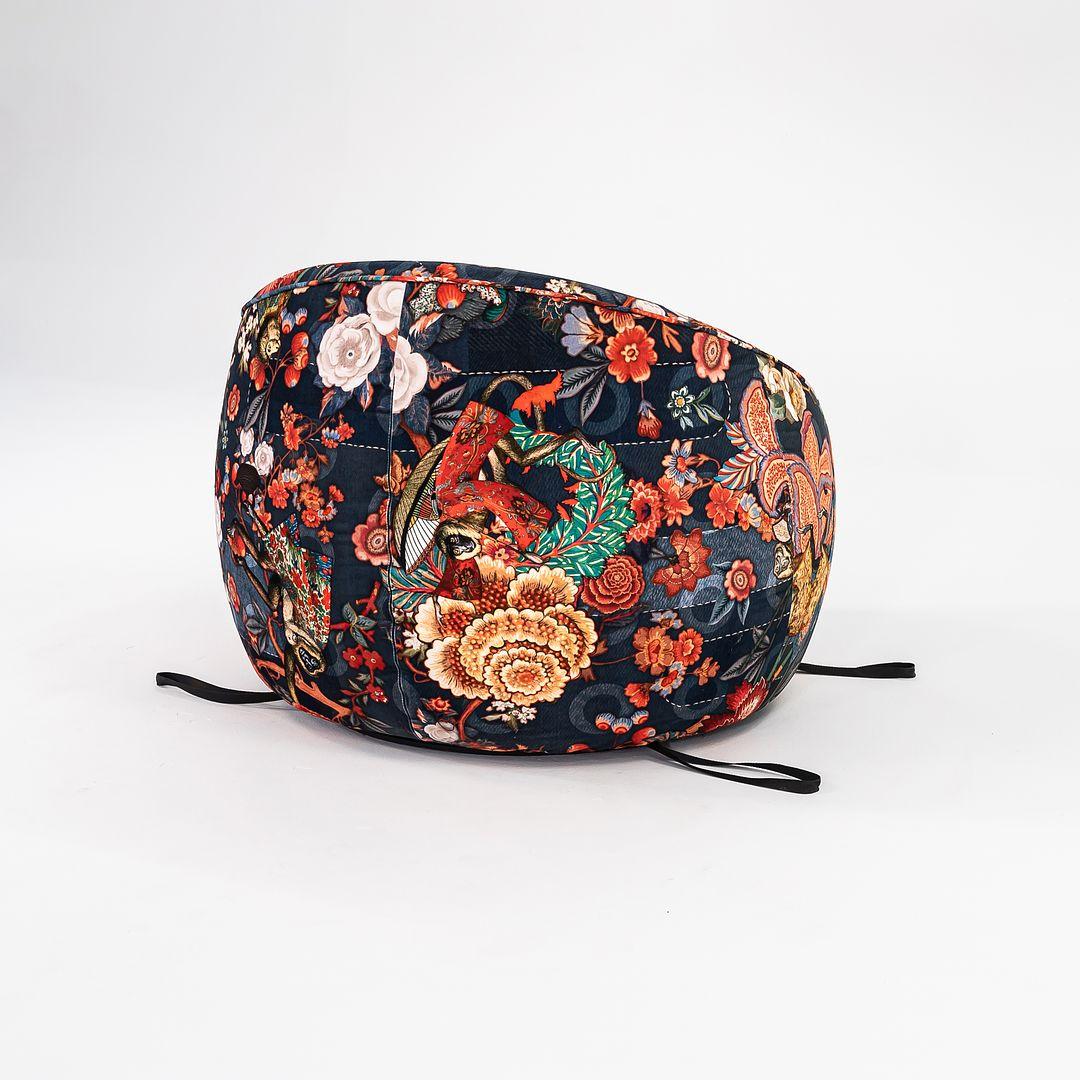 Listed for sale is a Hana Swivel Armchair made with a metal frame and velvety indigo blue fabric with a floral print. The chair was designed by Simone Bonanni and produced by Moooi¬†in the Netherlands. It dates to circa 2022 and is guaranteed as