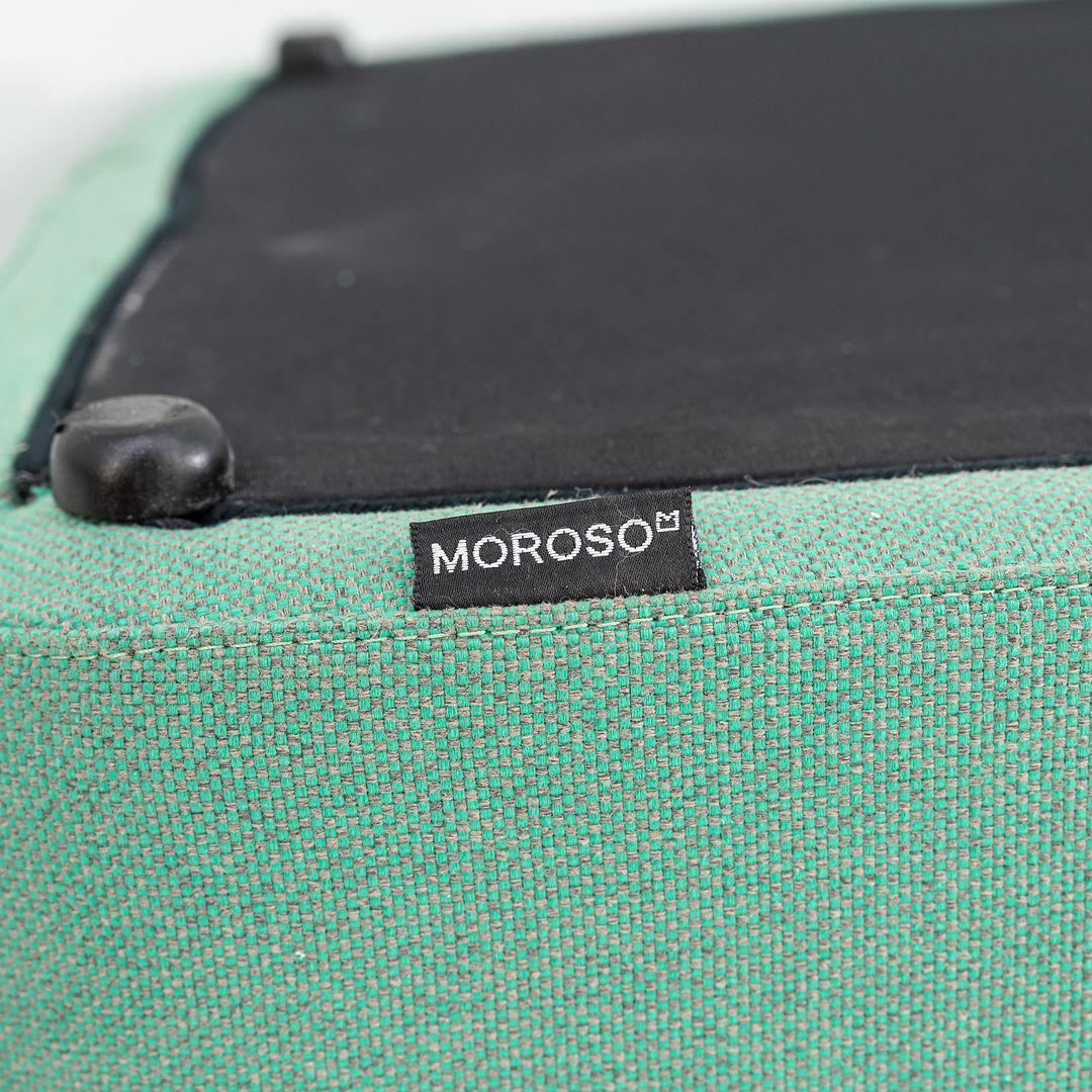This is a Taba lounge arm chair B, originally designed by Alfredo Haberli in 2020. This particular example was produced by Moroso in Italy circa 2023. The arm chair is made of a wood base, polyurethane foam, and upholstered in a green fabric.
 
 The