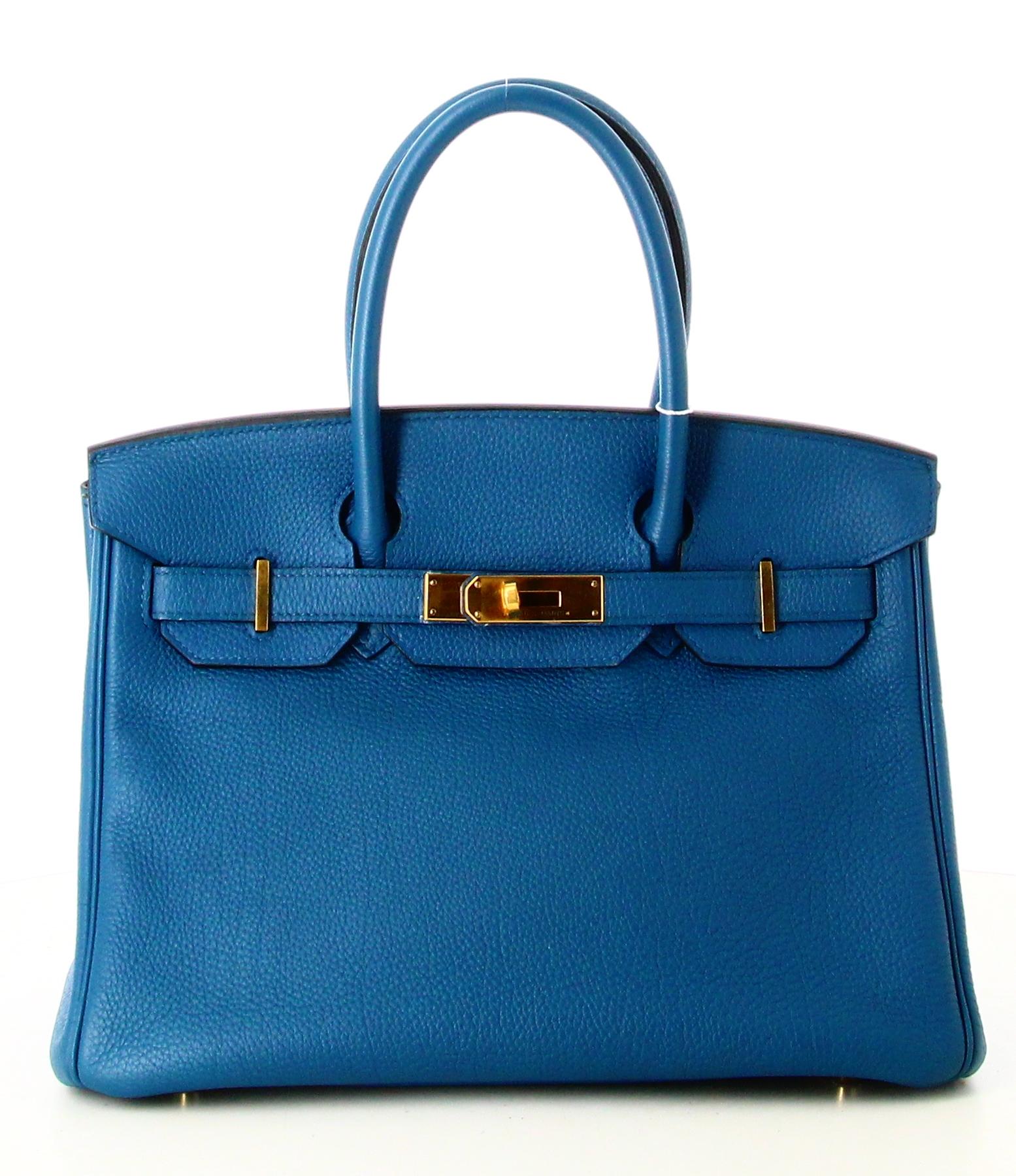 2023 Birkin Handbag 30 Hermes Blue Grain Leather

- Very good condition. Shows very slight signs of wear over time. 
- Birkin Handbag Hermès
- Blue grained leather
- Two blue leather handles
- Golden clasp