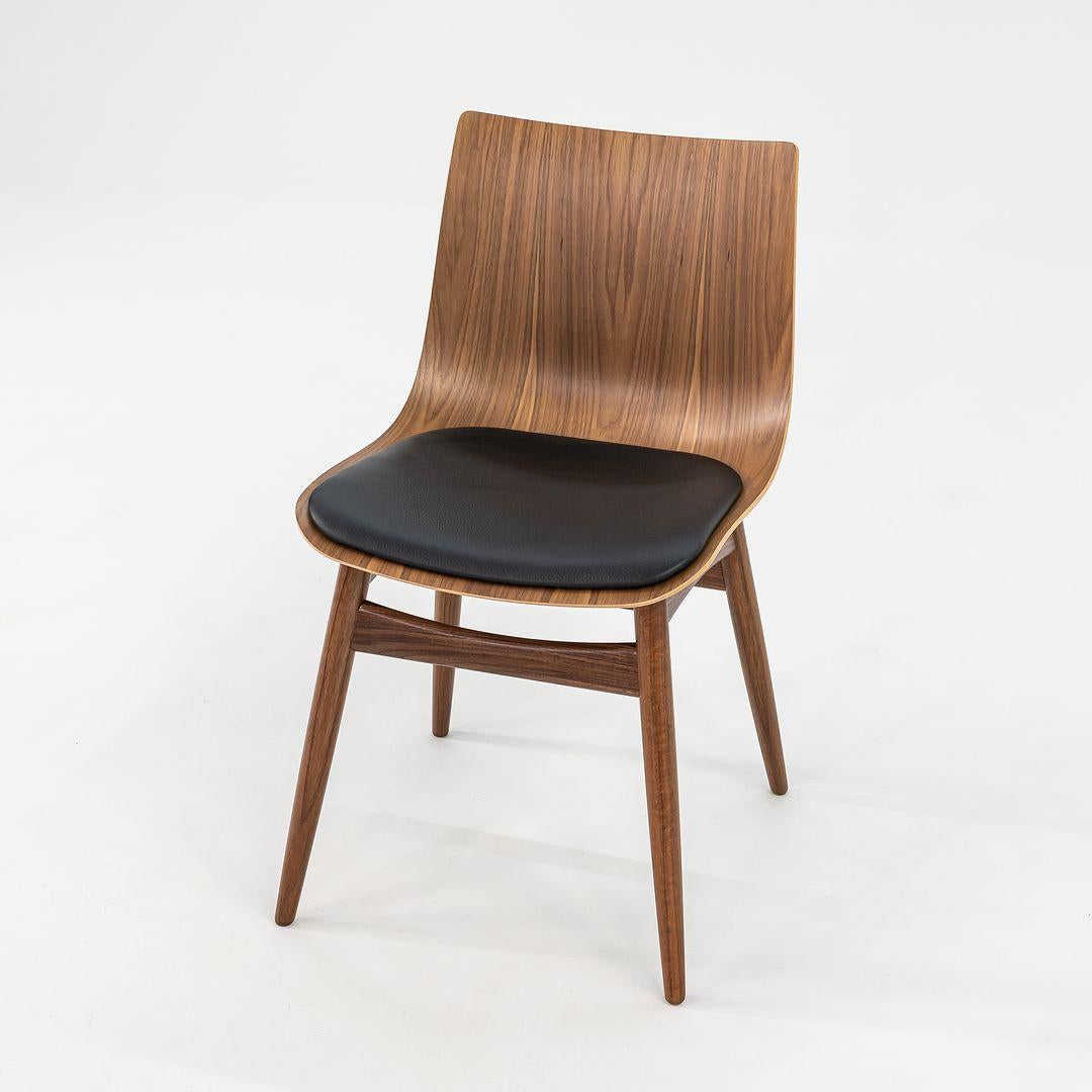 Listed for sale is a BA001S Preludia Wood Chair made with an oak frame and black leather seat. Designed by Brad Ascalon and produced by Carl Hansen & Son in Denmark, the chair dates circa 2023 and is guaranteed as authentic. Condition is excellent
