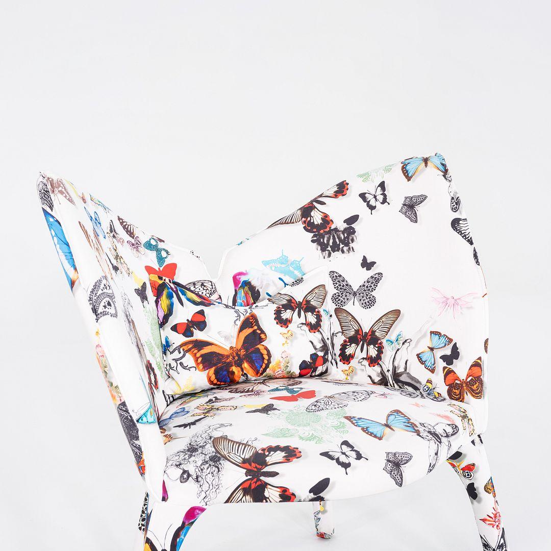 This is a Lady B. Arm Chair, originally designed by Cecile Maia Pujol in 2019. This particular example was produced by Roche Bobois in France in 2023. The chair is comprised of a wood frame and has a seat upholstered in tissue butterfly opalin. 
 

