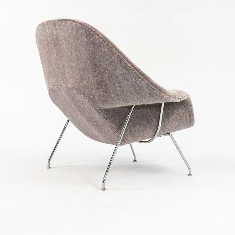 This is an original full-size Womb lounge chair, model 70L, designed by Eero Saarinen for Florence Knoll in 1946. This particular example was manufactured by Knoll in 2023. The piece features a seat that is formed of foam-covered molded fiberglass