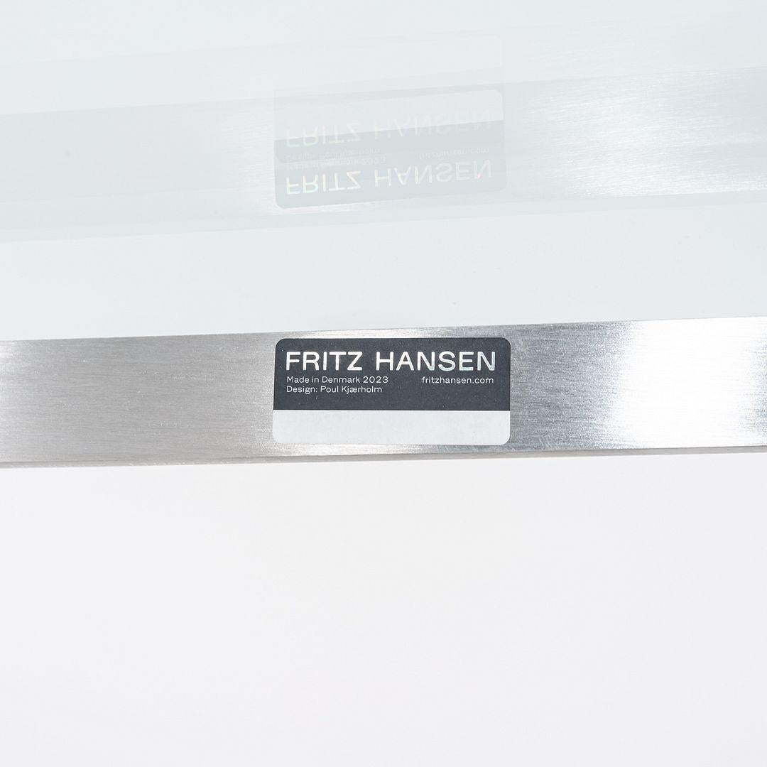 Contemporary 2023 Poul Kjaerholm for Fritz Hansen PK61A Glass & Stainless Coffee Table For Sale