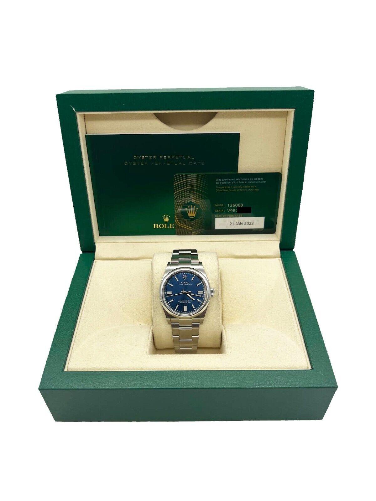 Style Number: 126000

Serial: V9R70***

Year: 2023

Model: Oyster Perpetual 

Case Material: Stainless Steel 

Band: Stainless Steel 

Bezel: Stainless Steel  Smooth Bezel 

Dial: Blue 

Face: Sapphire Crystal 

Case Size: 36mm

Includes: 

-Rolex