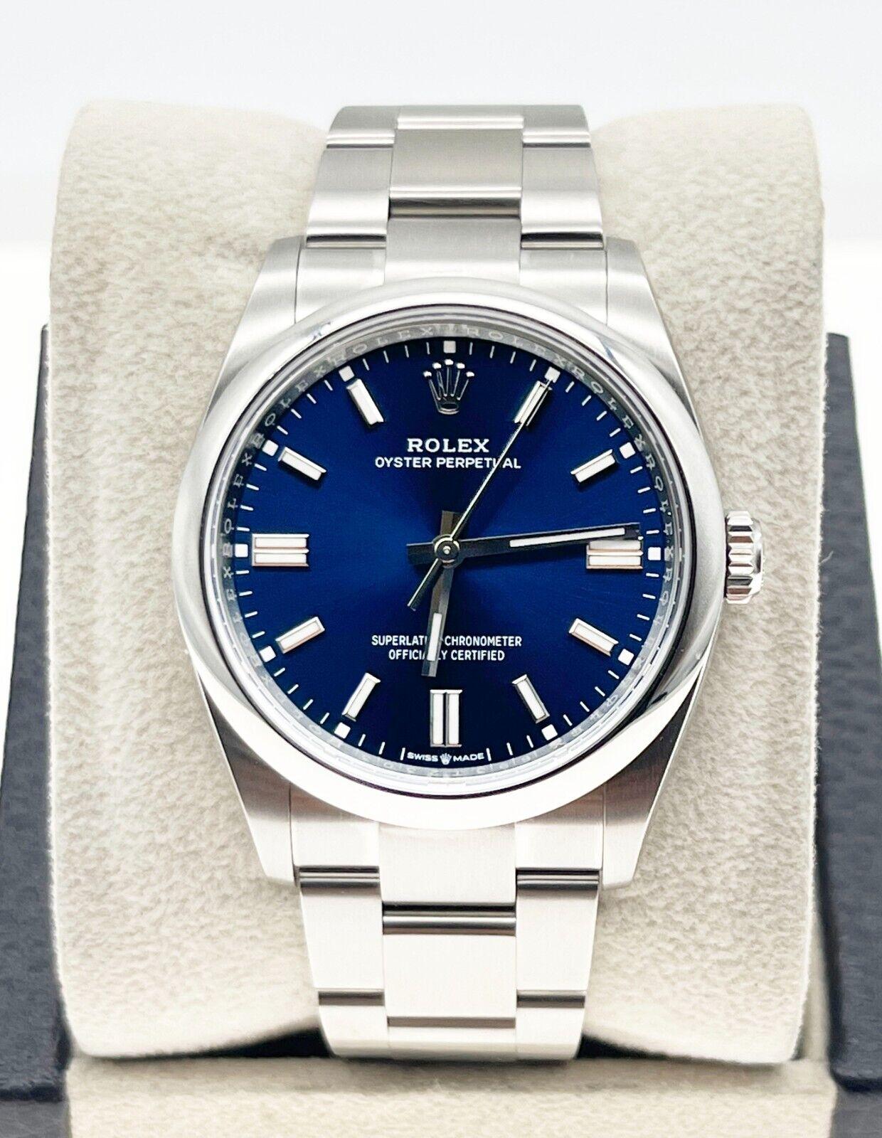 2023 Rolex 126000 Oyster Perpetual Blue Dial Stainless Steel Box Paper In Excellent Condition For Sale In San Diego, CA