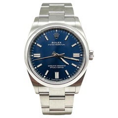 Used 2023 Rolex 126000 Oyster Perpetual Blue Dial Stainless Steel Box Paper