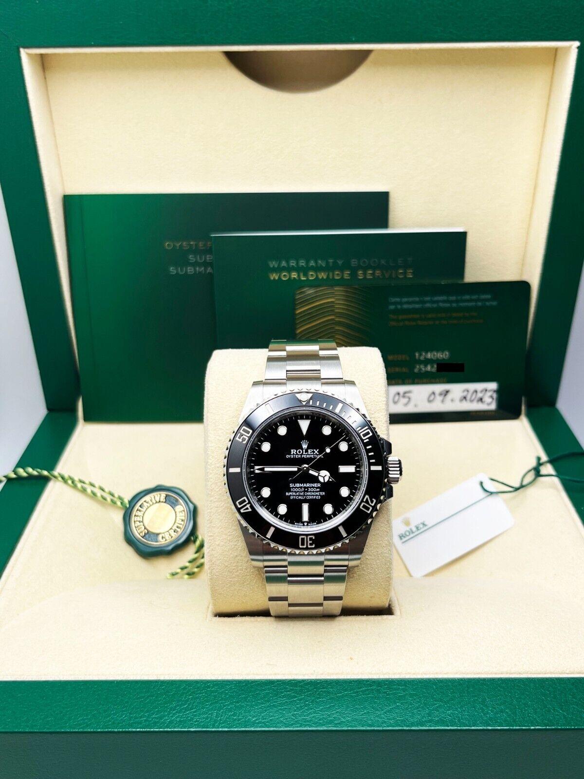 2023 Rolex Submariner 124060 Ceramic 41mm Stainless Steel Box Paper In Excellent Condition For Sale In San Diego, CA