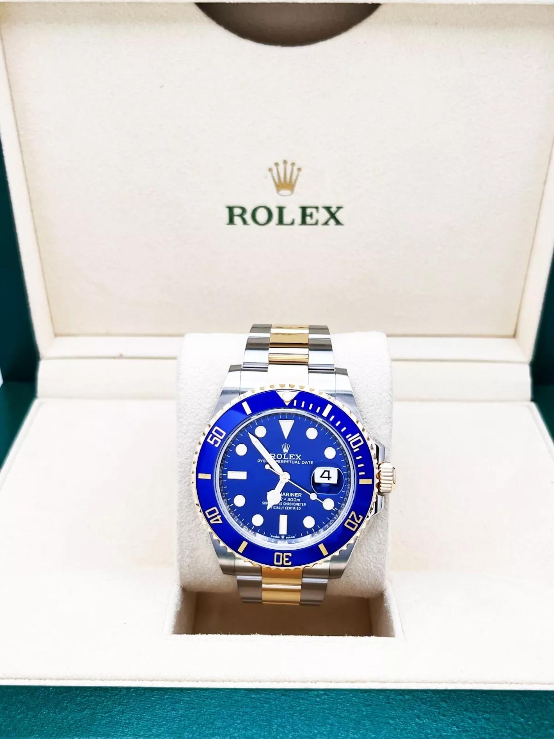 Style Number: 126613LB

Serial: 04T7V***

Year: 2023

Model: Submariner

Case Material: Stainless Steel

Band: 18K Yellow Gold & Stainless Steel 

Bezel: Blue Ceramic

Dial: Blue 

Face: Sapphire Crystal

Case Size: 41mm 

Includes: 

-Rolex Box &