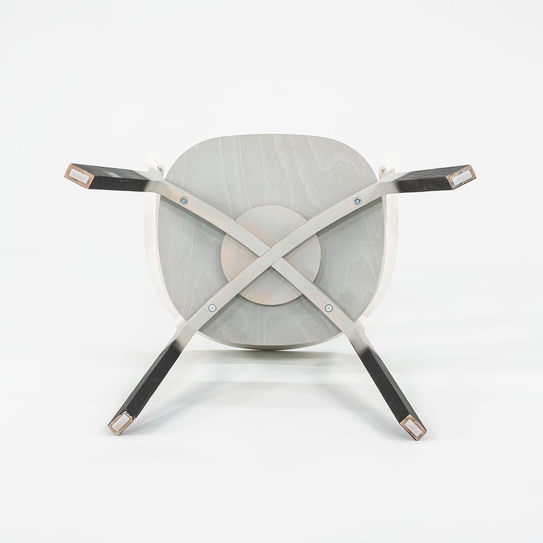 This is a Wood Bikini chair, originally designed by Werner Aisslinger in 2013. This particular example was produced by Moroso in Italy circa 2023. The chair is made up entirely of varnished ash wood. 
 
 The Wood Bikini chair measures 22 inches