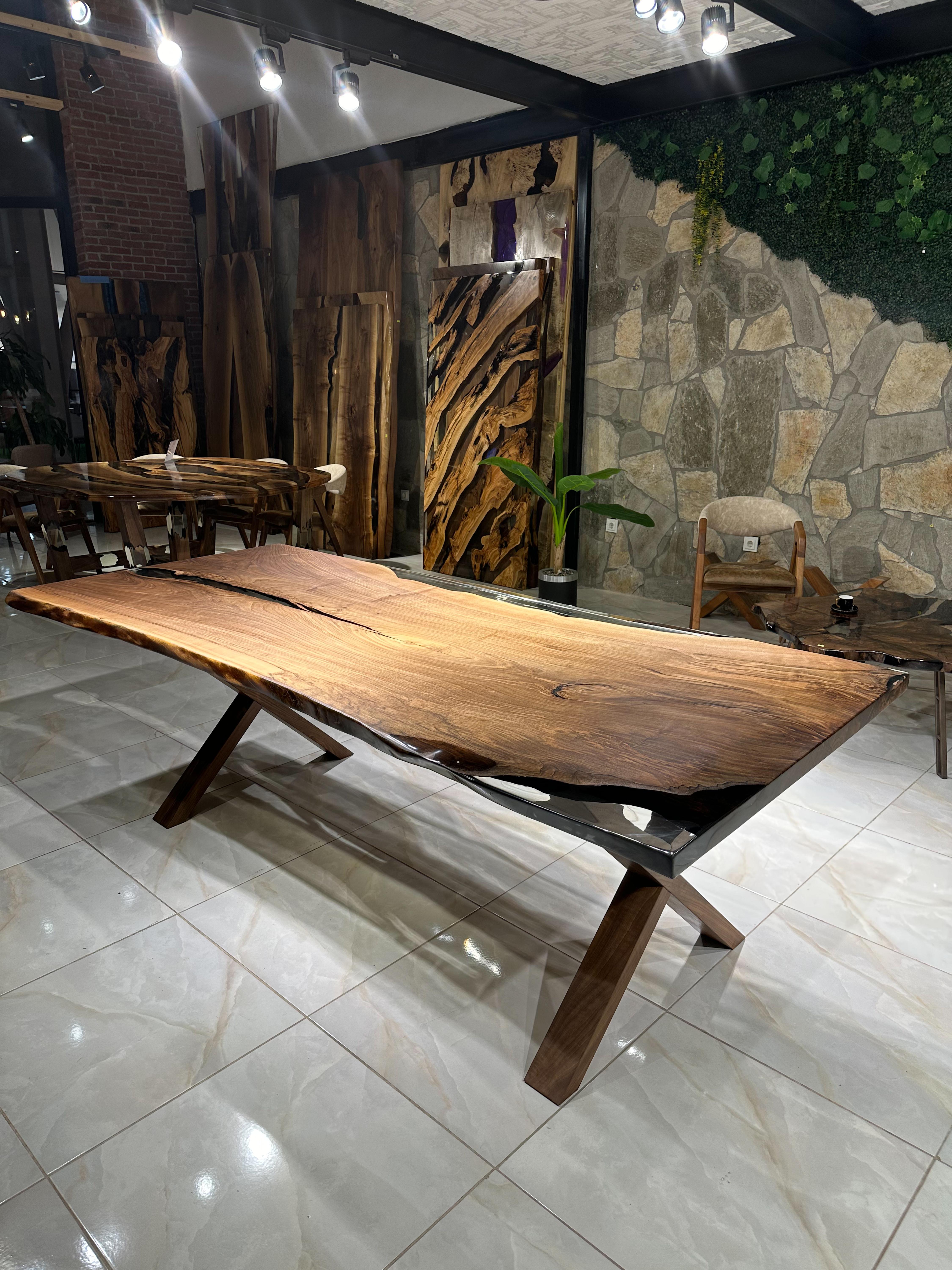 Walnut Wood and Clear Epoxy Table - Custom sizes are available!

This table seamlessly combines the warmth of walnut wood with the modern touch of clear epoxy. It’s a beautiful centerpiece for any room.

Features:

Materials: The tabletop showcases