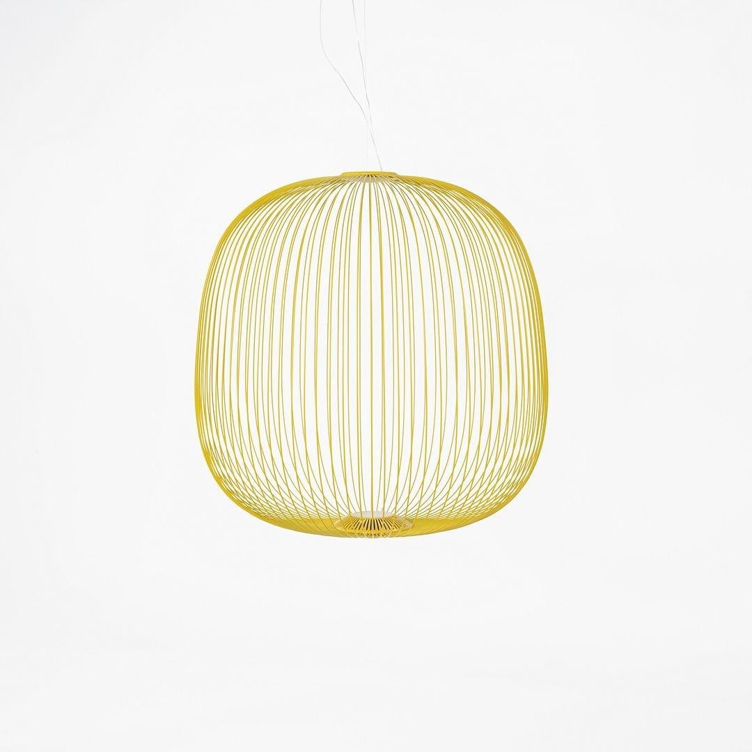 This is a Spokes 2 Suspension LED Lamp, originally designed by Garcia Cumini in 2015. This particular example was produced by Foscarini in Italy C. 2024. The lamps design is comprised of varnished steel and aluminum.
 
 The lamp measures 20.5 inches
