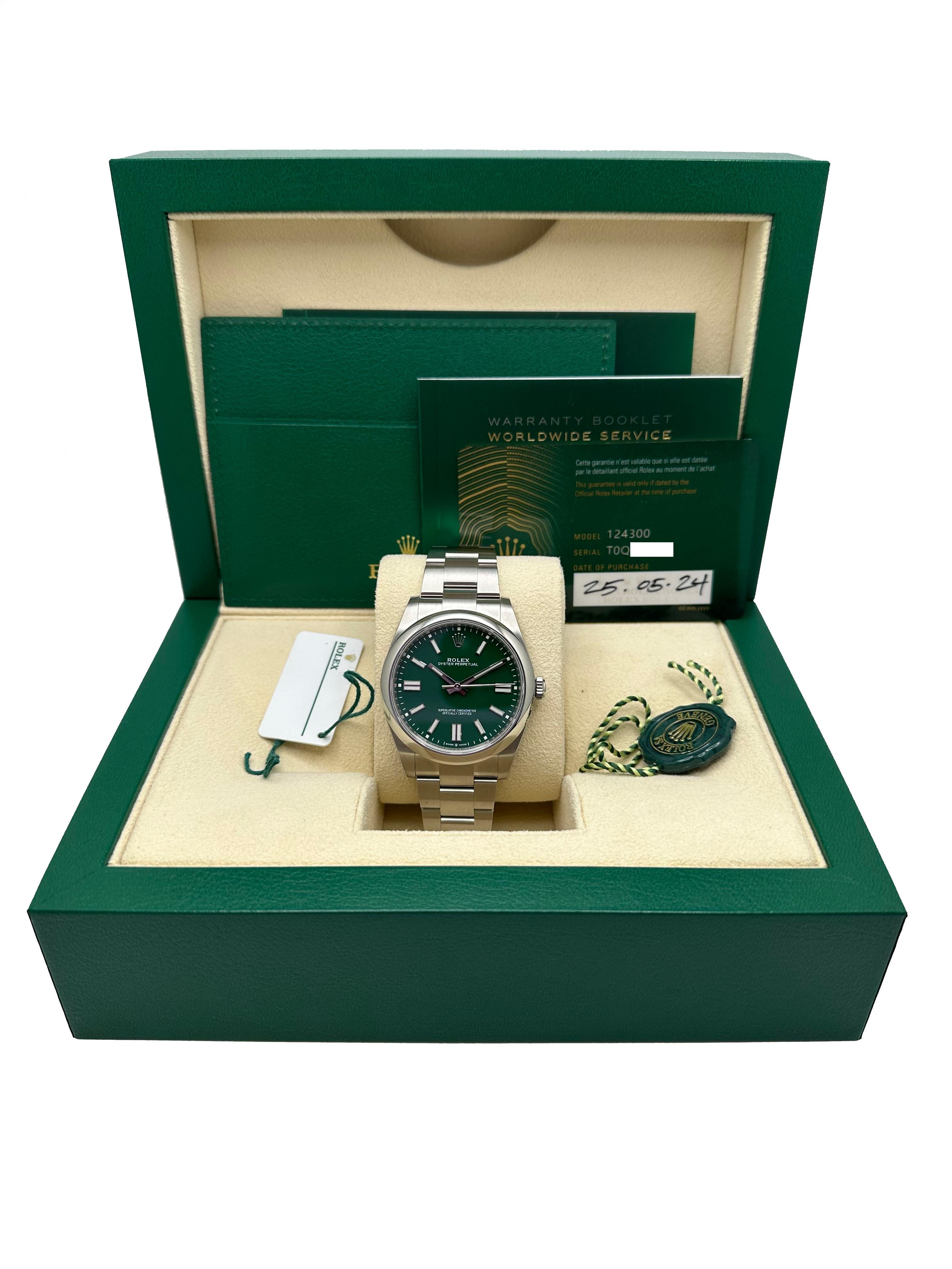 Style Number: 124300
Serial: T0Q84***
Year: 2024
Model: Rolex Oyster Perpetual 
Case Material: Stainless Steel 
Band: Stainless Steel 
Bezel: Stainless Steel 
Dial: Green 
Face: Sapphire Crystal 
Case Size: 41mm 
Includes: 
-Rolex Box &