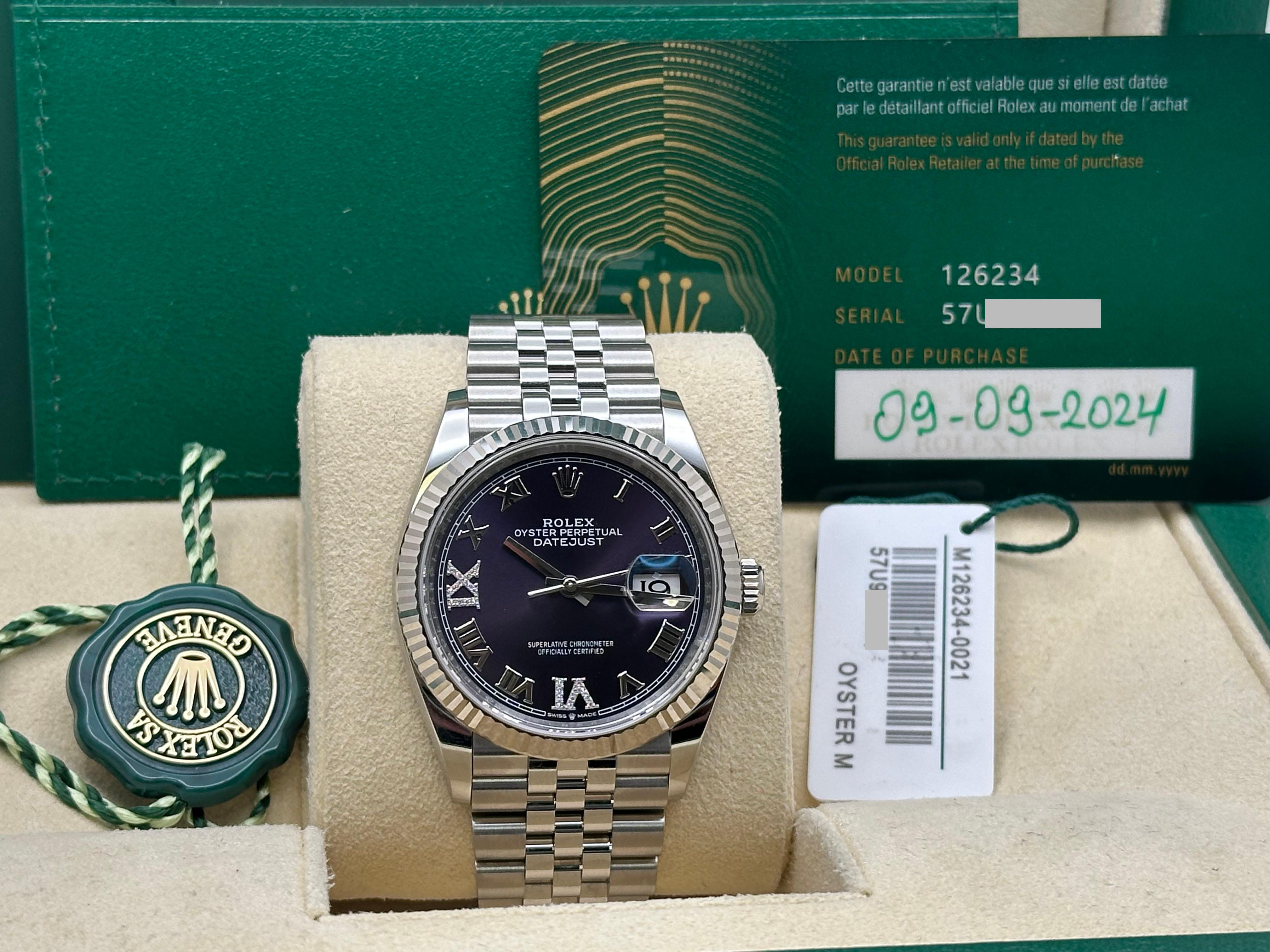 Style Number: 126234



Serial: 57U9N***



Year: 2024

 

Model: Rolex Datejust 

 

Case Material: Stainless Steel 

 

Band: Stainless Steel Jubilee Band 

  

Bezel: 18K White Gold Fluted Bezel 

  

Dial: Purple Aubergine Roman Diamond at 6 and