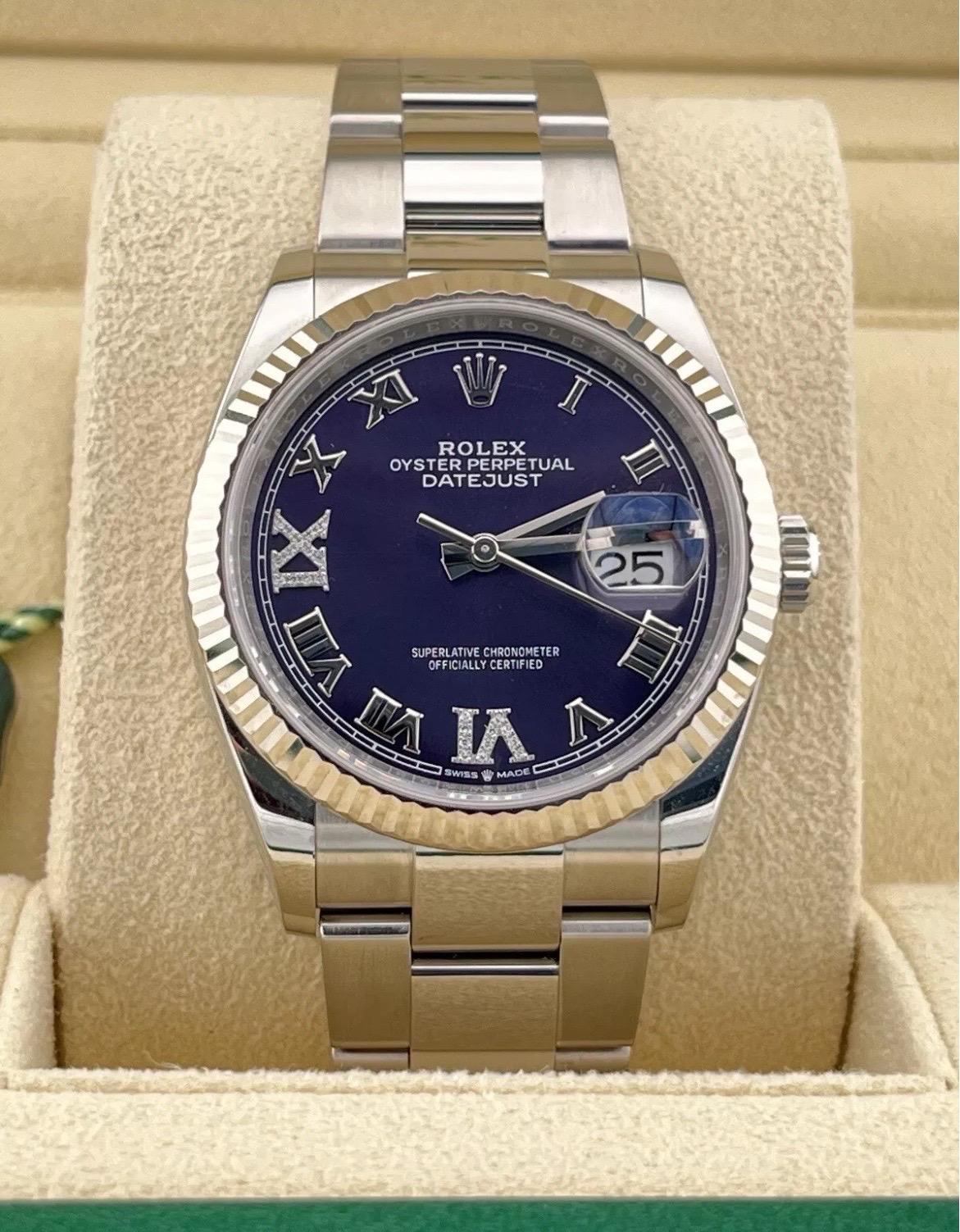 Haz una declaración audaz pero elegante con este Rolex Datejust 2024 de 36 mm (Ref. 126234), una mezcla perfecta de sofisticación moderna y artesanía atemporal. La característica más destacada de este modelo es la llamativa esfera berenjena (púrpura