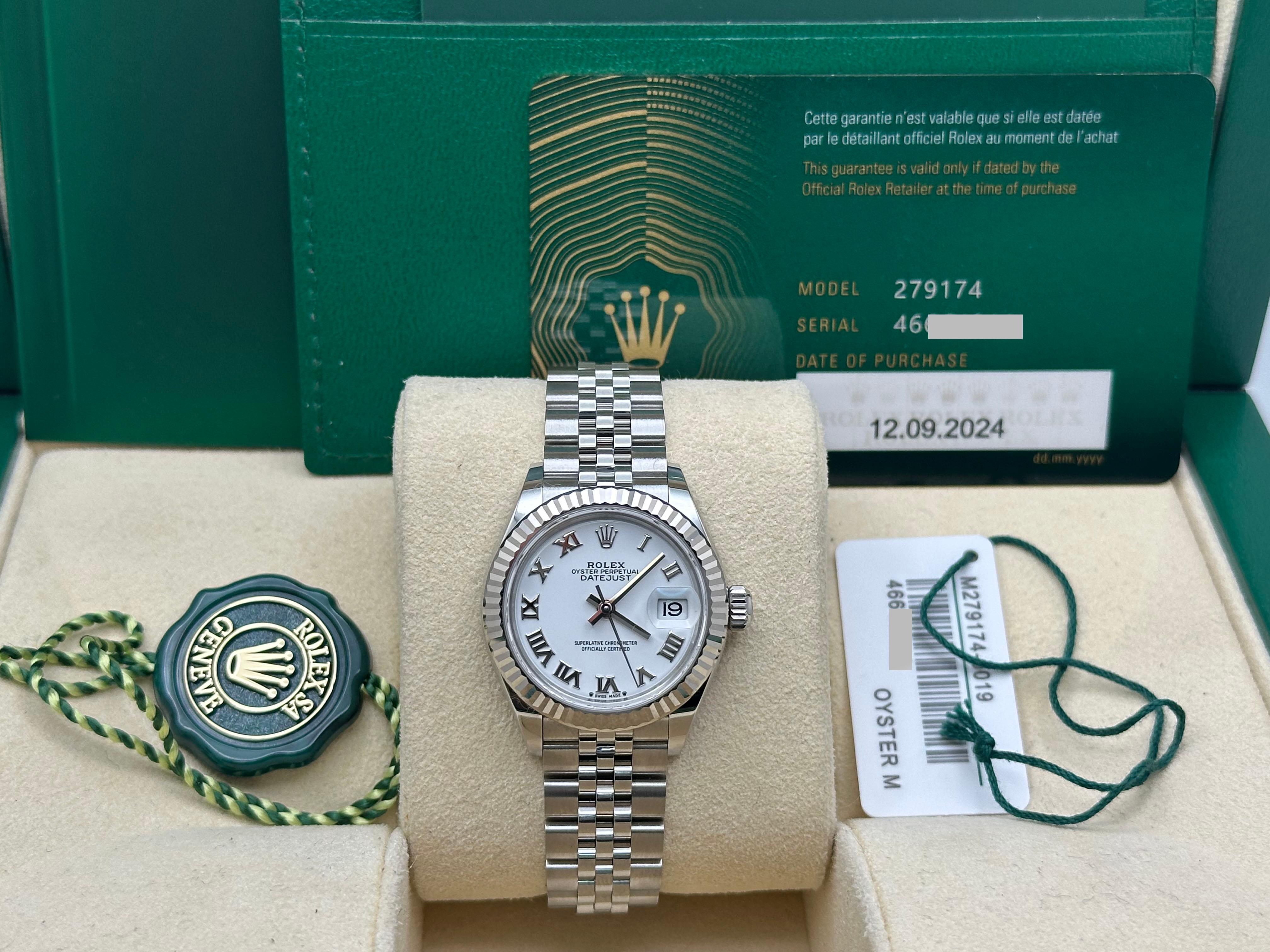 Style Number: 279174



Serial: 466GJ***



Year: 2024

 

Model: Rolex Datejust 

 

Case Material: Stainless Steel 

 

Band: Stainless Steel Jubilee Band 

  

Bezel: 18K White Gold Fluted Bezel 

  

Dial: White Roman Dial 

 

Face: Sapphire