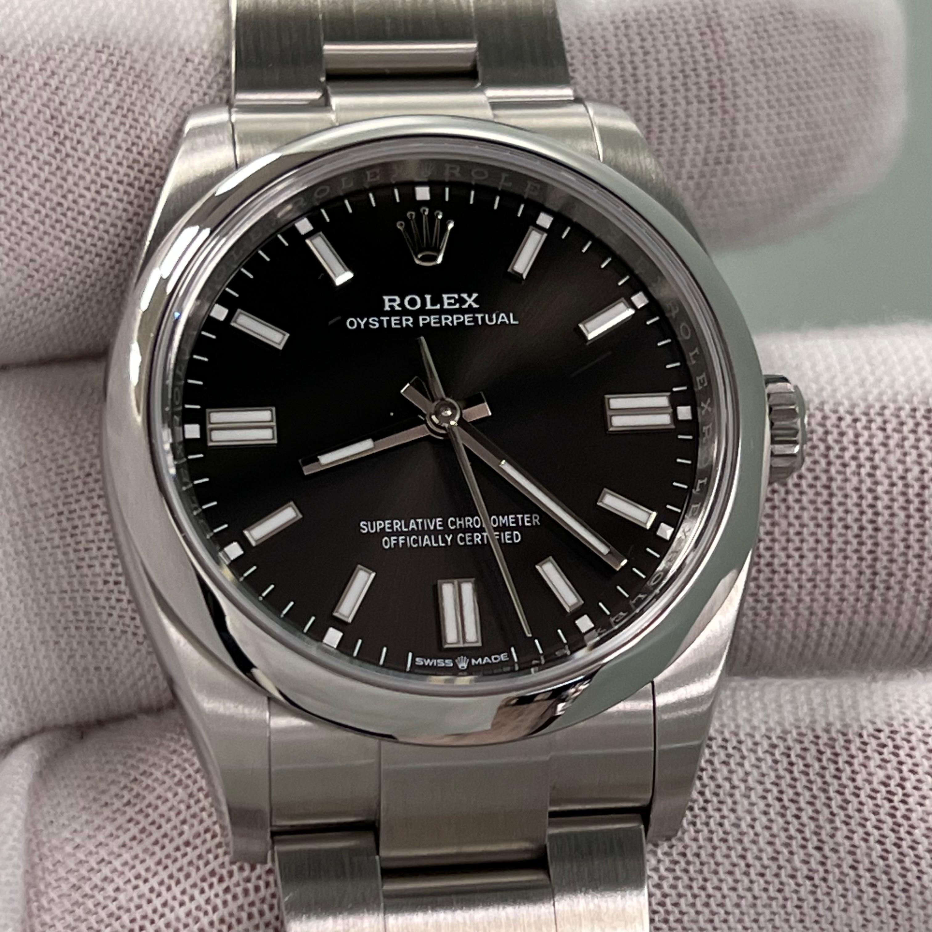 2024 Rolex Oyster Perpetual 126000 36mm Black Dial Stainless Steel Box Paper For Sale 4