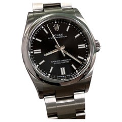 2024 Rolex Oyster Perpetual 126000 36mm Schwarzes Zifferblatt Edelstahl Box Papier