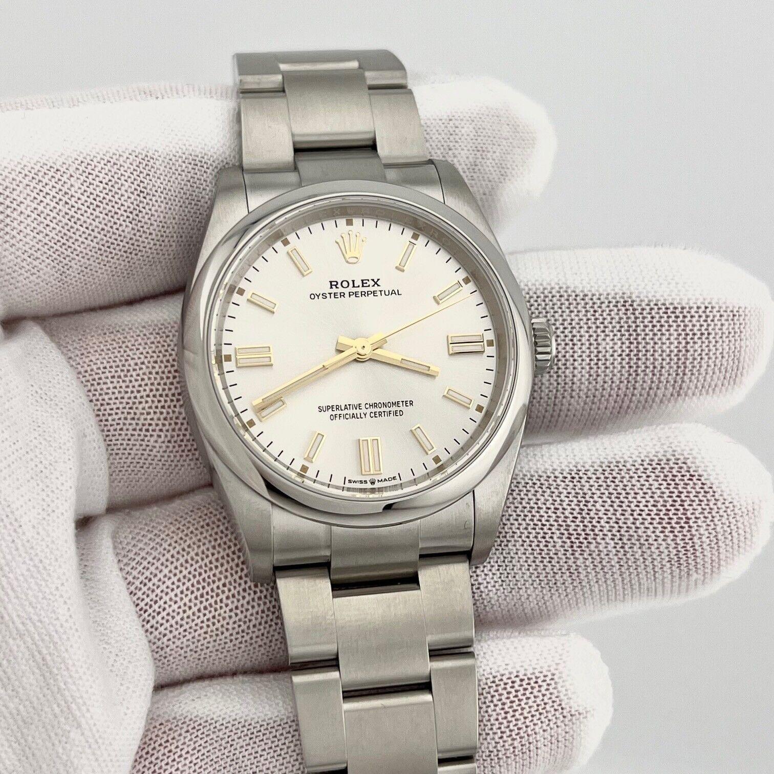 2024 Rolex Oyster Perpetual 126000 36mm Silber Zifferblatt Edelstahl Box Papier 1