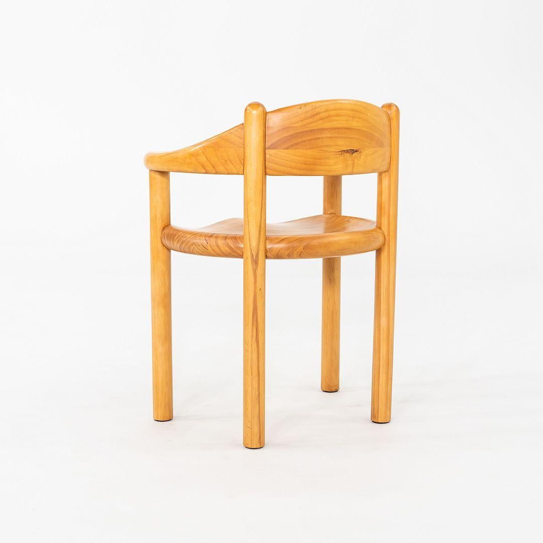This is a set of five Daumiller Dining Armchairs, originally designed by Rainer Daumiller in 1977. These particular examples were produced by GUBI in Denmark in 2024. The chairs are comprised of solid pine. The listed price includes all five chairs