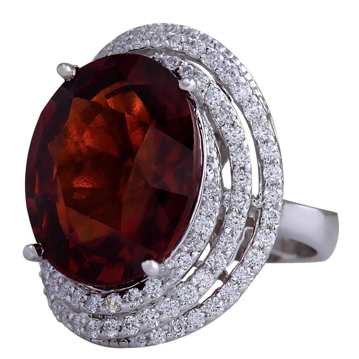 Indulge in the exquisite beauty of our Natural Hessonite Garnet Diamond Ring, meticulously crafted in opulent 14 Karat White Gold. Each element of this stunning piece speaks to impeccable craftsmanship and timeless elegance, making it a captivating
