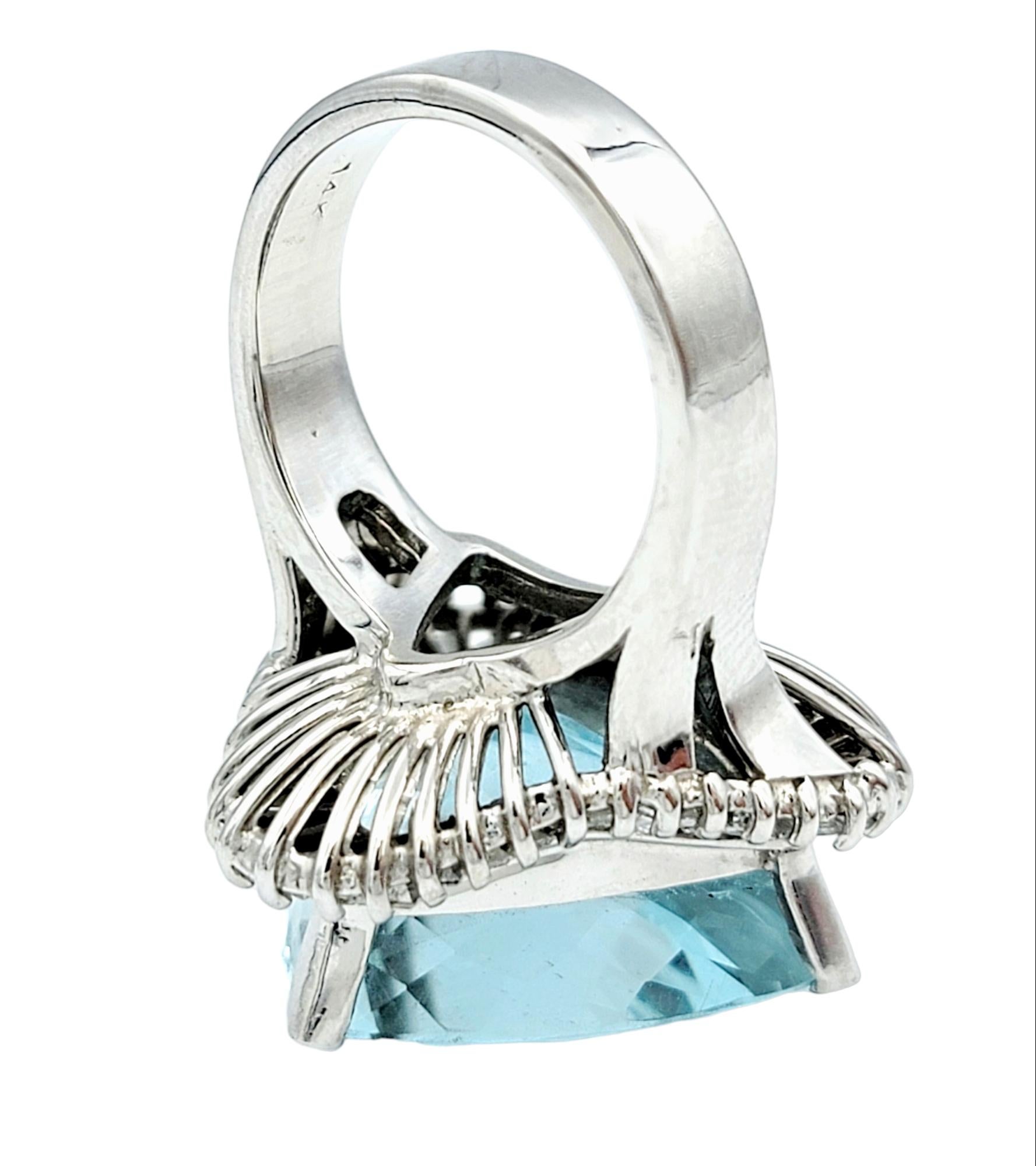 Women's 20.25 Carat Trillion Aquamarine Ring with Baguette Diamonds 14 Karat White Gold For Sale