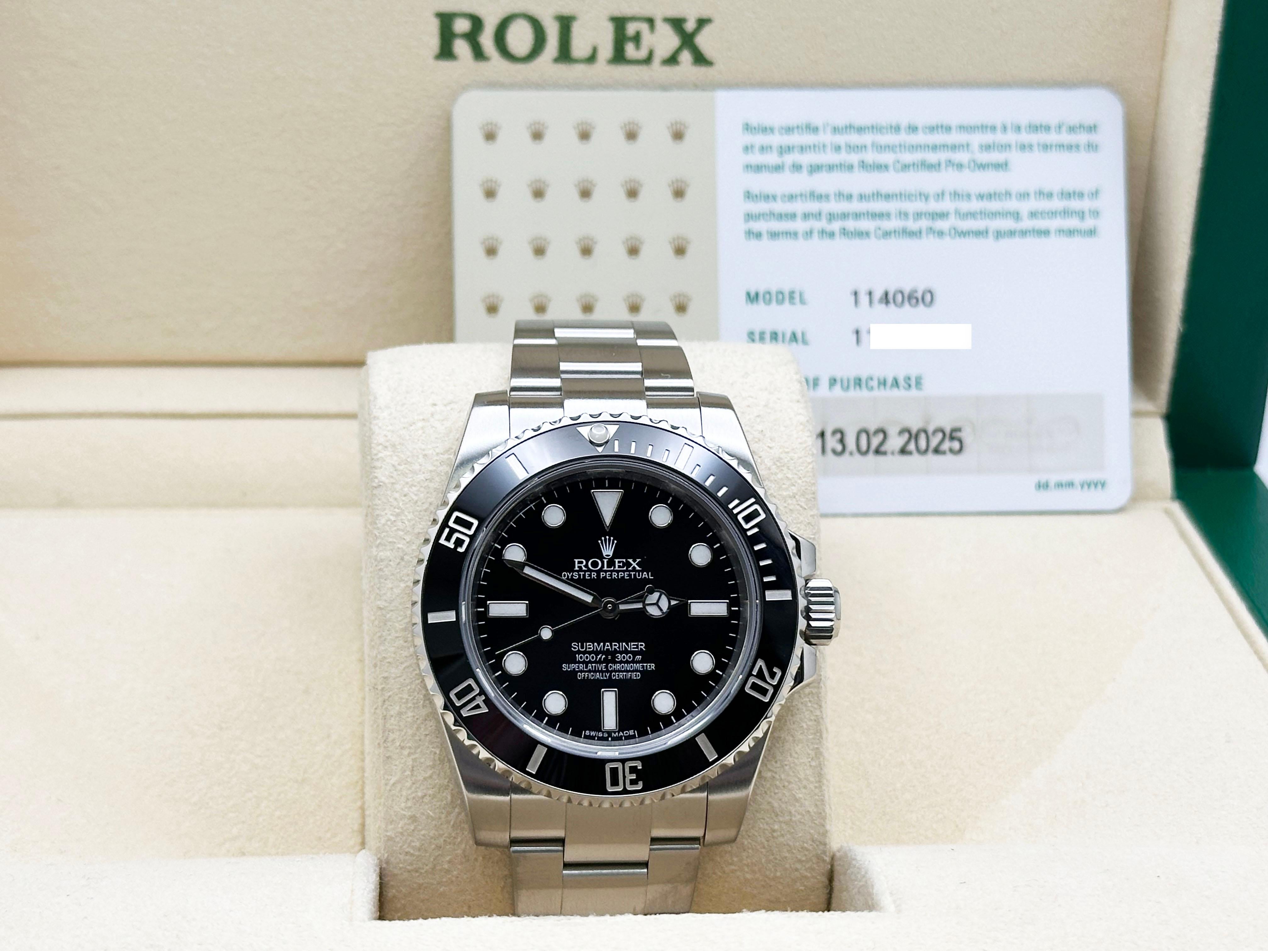 Style Number: 114060



Serial: 11J23***



Year: 2010-2020 (CPO by Rolex in 2025)

 

Model: Rolex Submariner No Date

 

Case Material: Stainless Steel 

 

Band:  Stainless Steel 

  

Bezel: Black Ceramic

  

Dial: Black Dial 

 

Face: