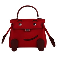 2025 Hermès Rouge Radieux Swift Kelly Doll PHW