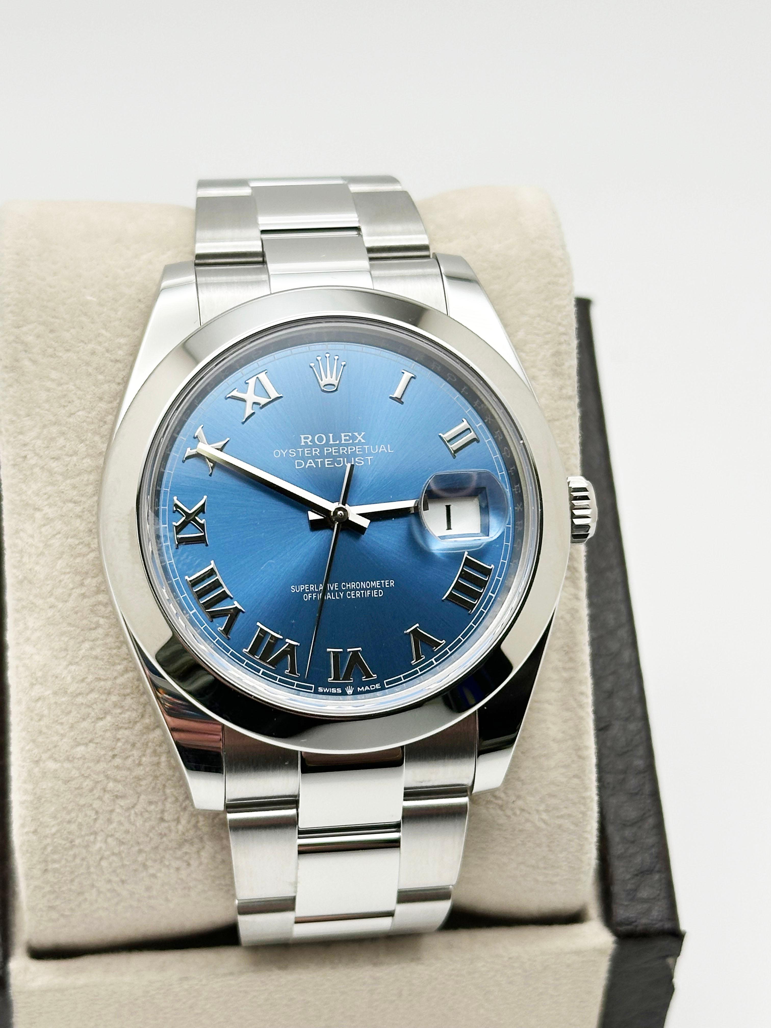 Style Number: 126300



Serial: F4451***



Year: 2025 

 

Model: Rolex Datejust 41

 

Case Material: Stainless Steel 

 

Band: Stainless Steel 

  

Bezel: Stainless Steel 

  

Dial: Blue Roman Dial 

 

Face: Sapphire Crystal 

 

Case Size: